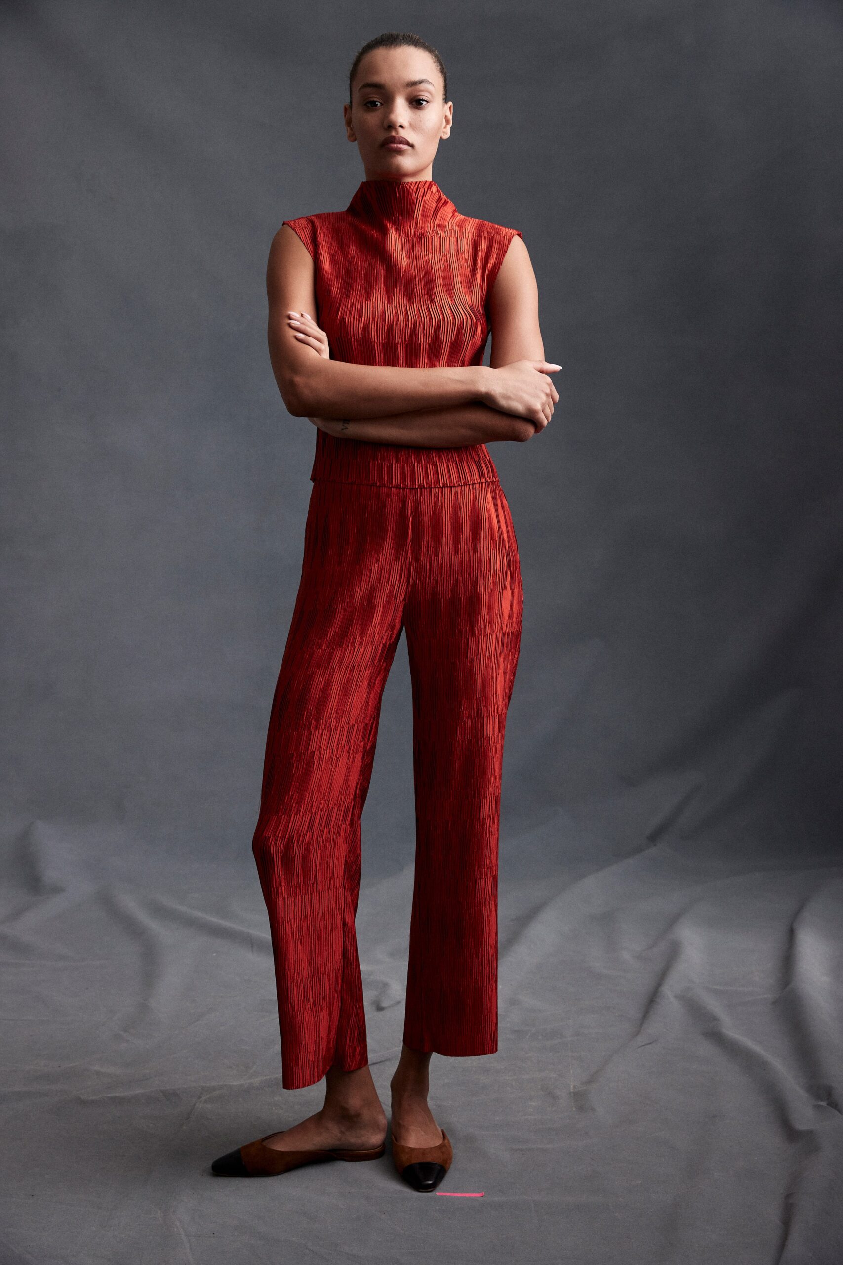 fitted red sleeveless jumpsuit