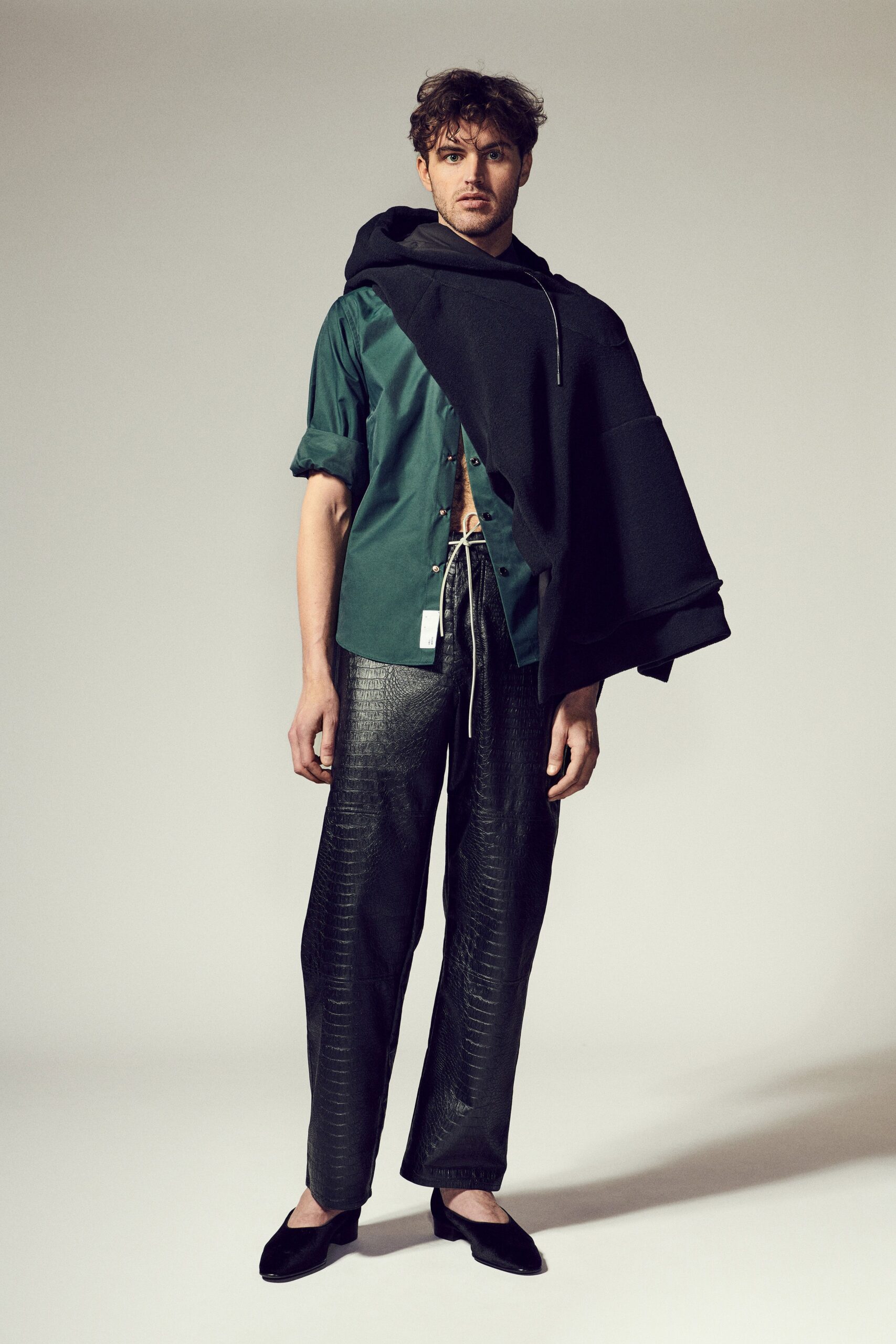 green relaxed shirt with black pants