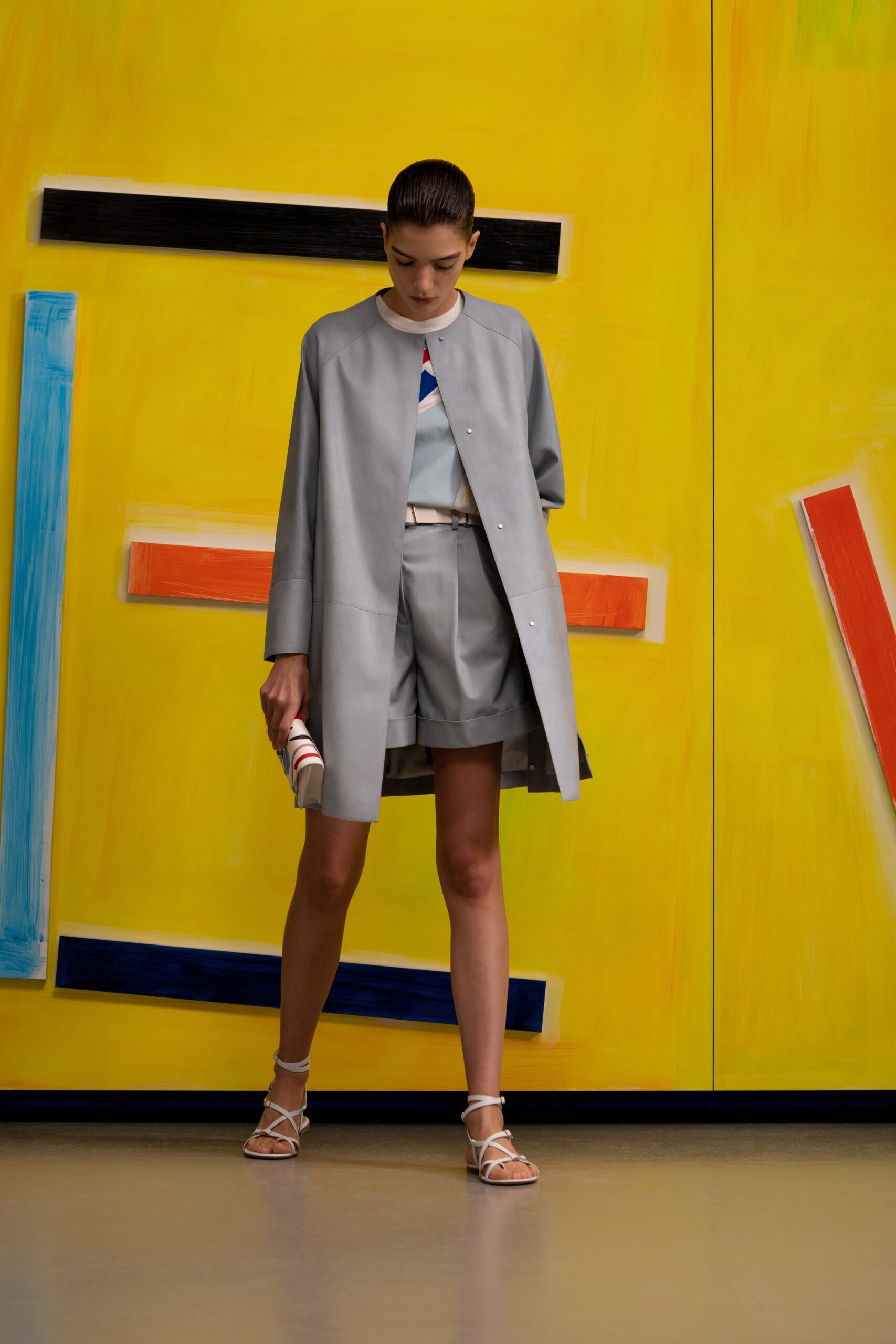 gray leather coat with shorts