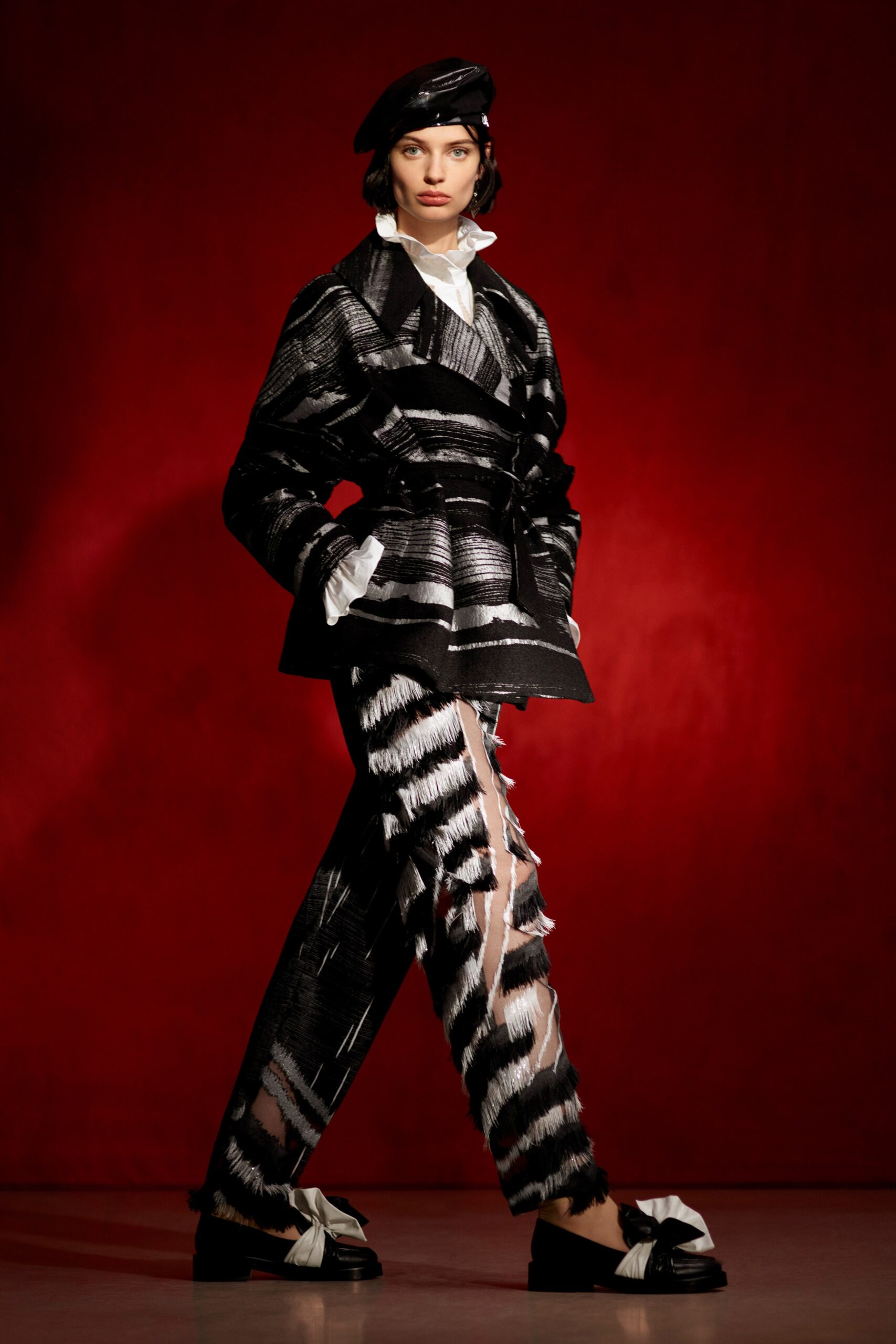 black wool long-sleeve collared tailored buttoned layered jacket