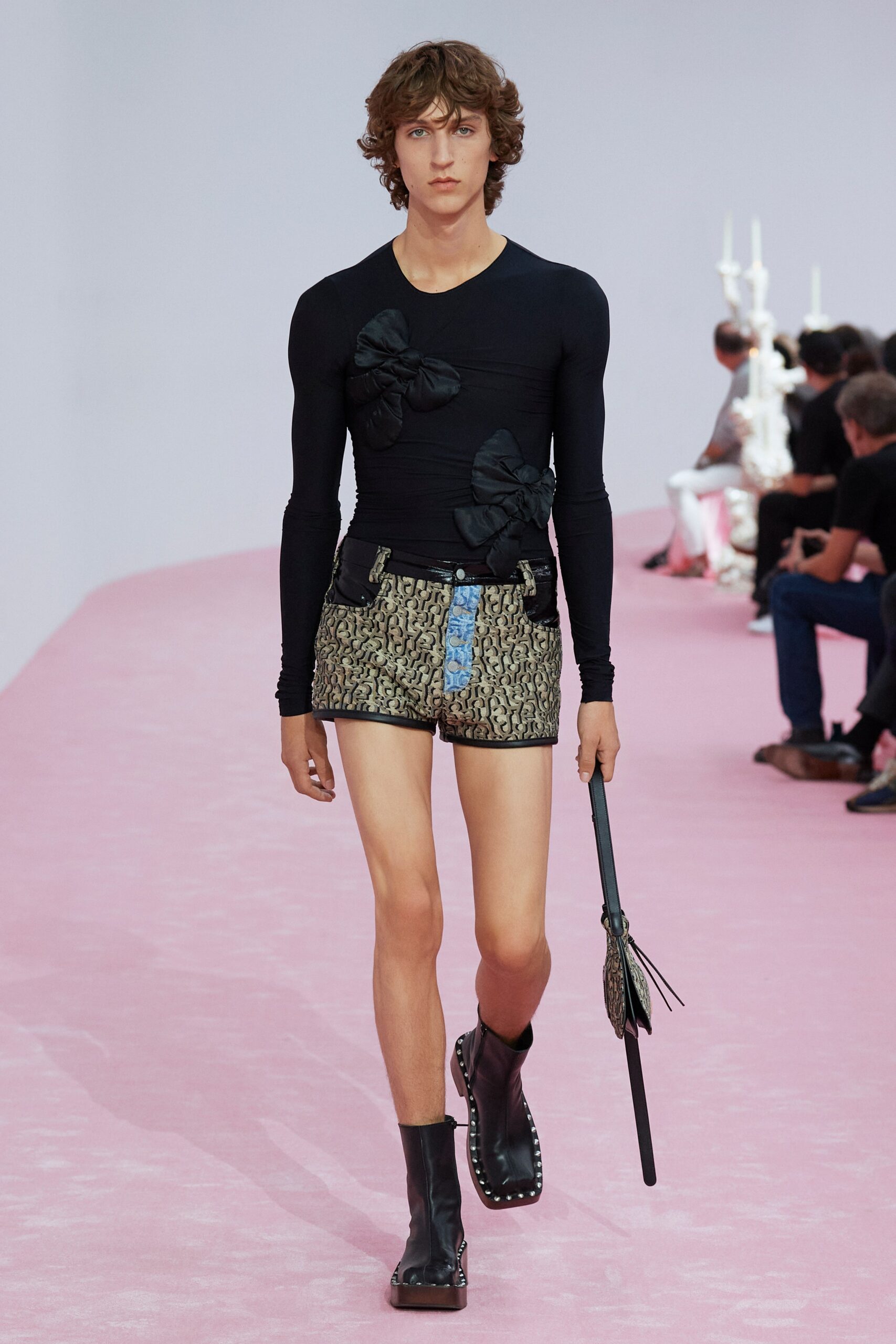 black fitted top with multi shorts