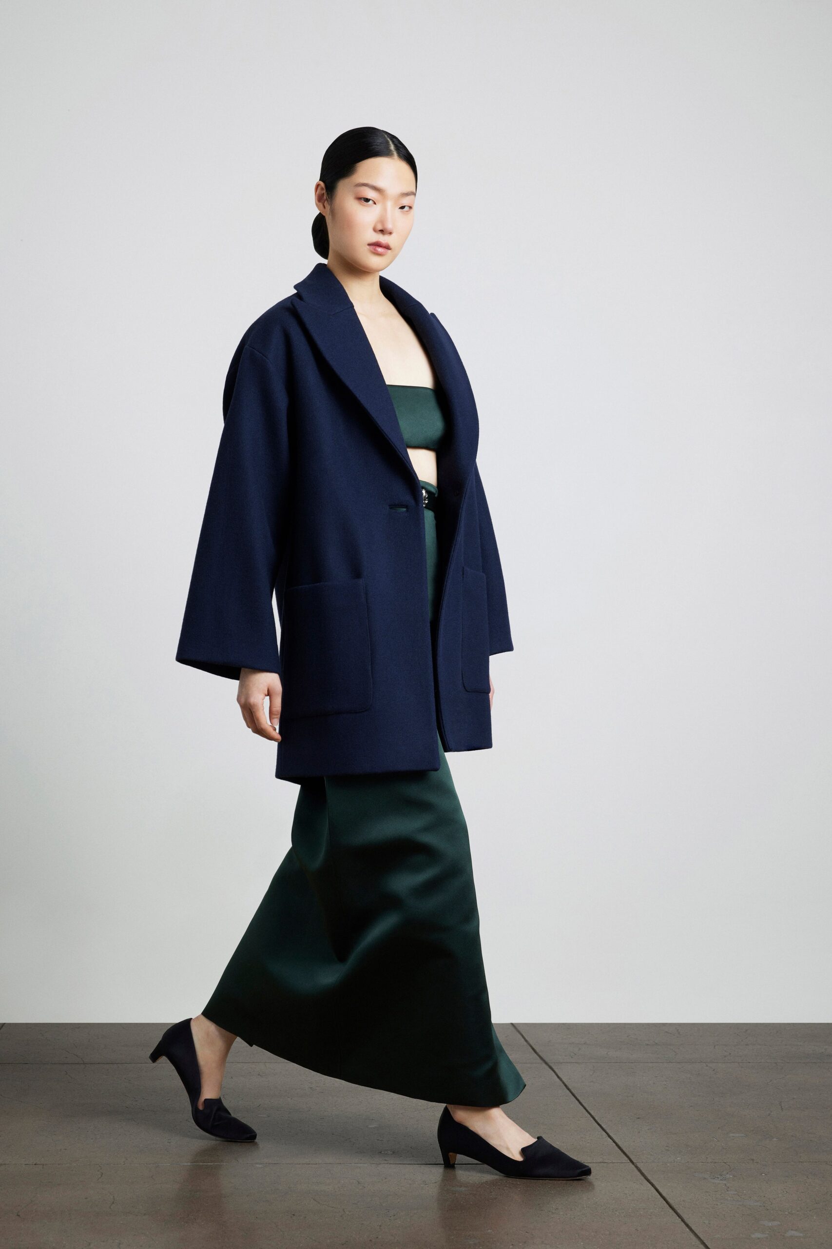 navy wool coat and green silk dress
