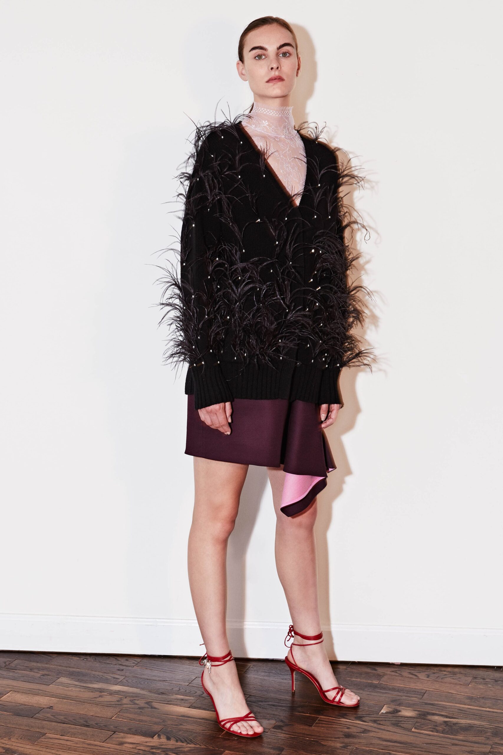 black fringed top with asymmetric skirt