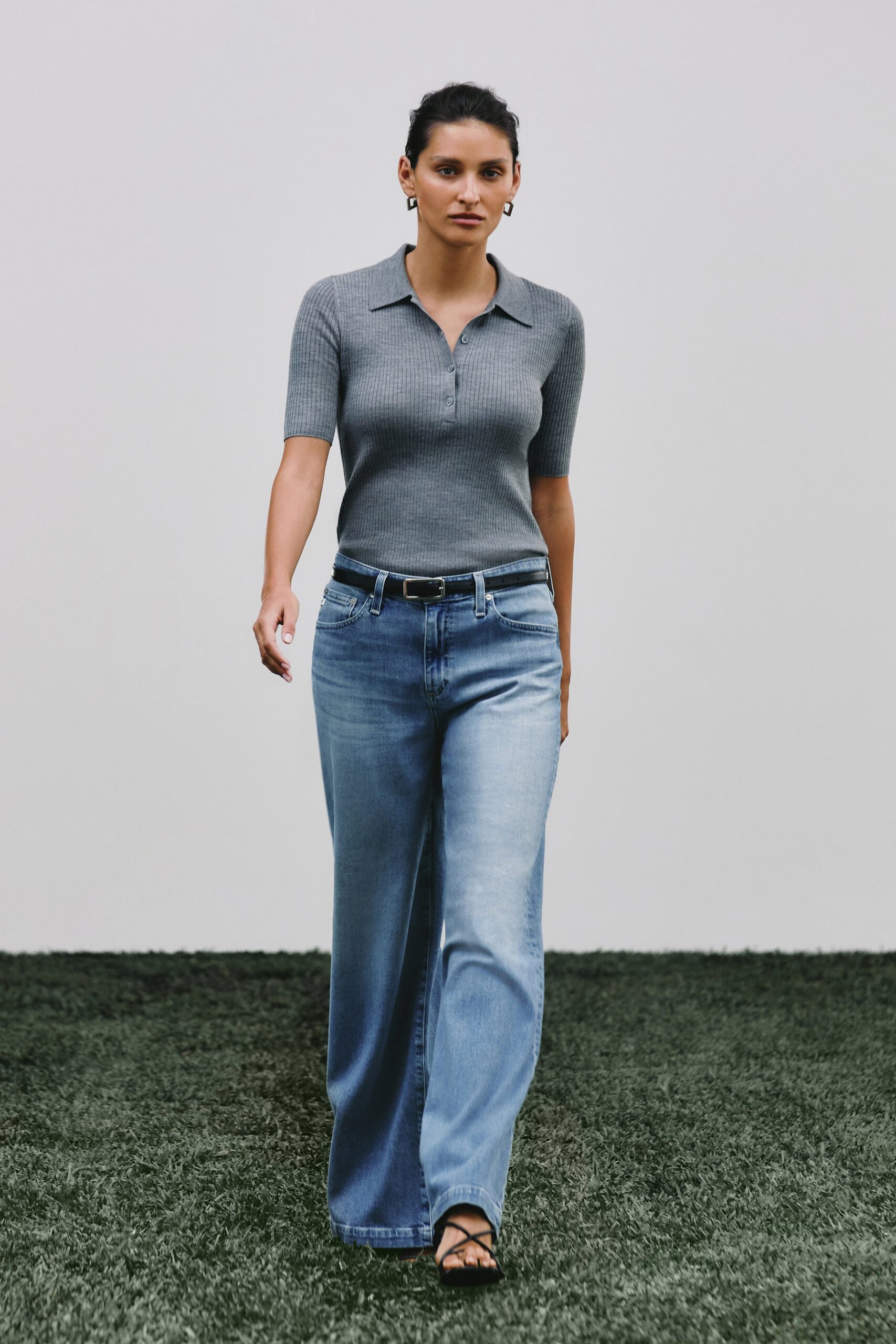 gray fitted top with relaxed jeans