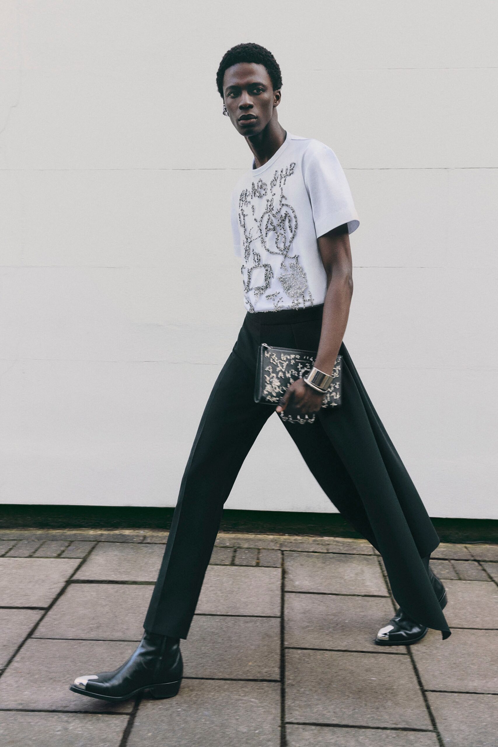 white printed t-shirt with black tailored pants