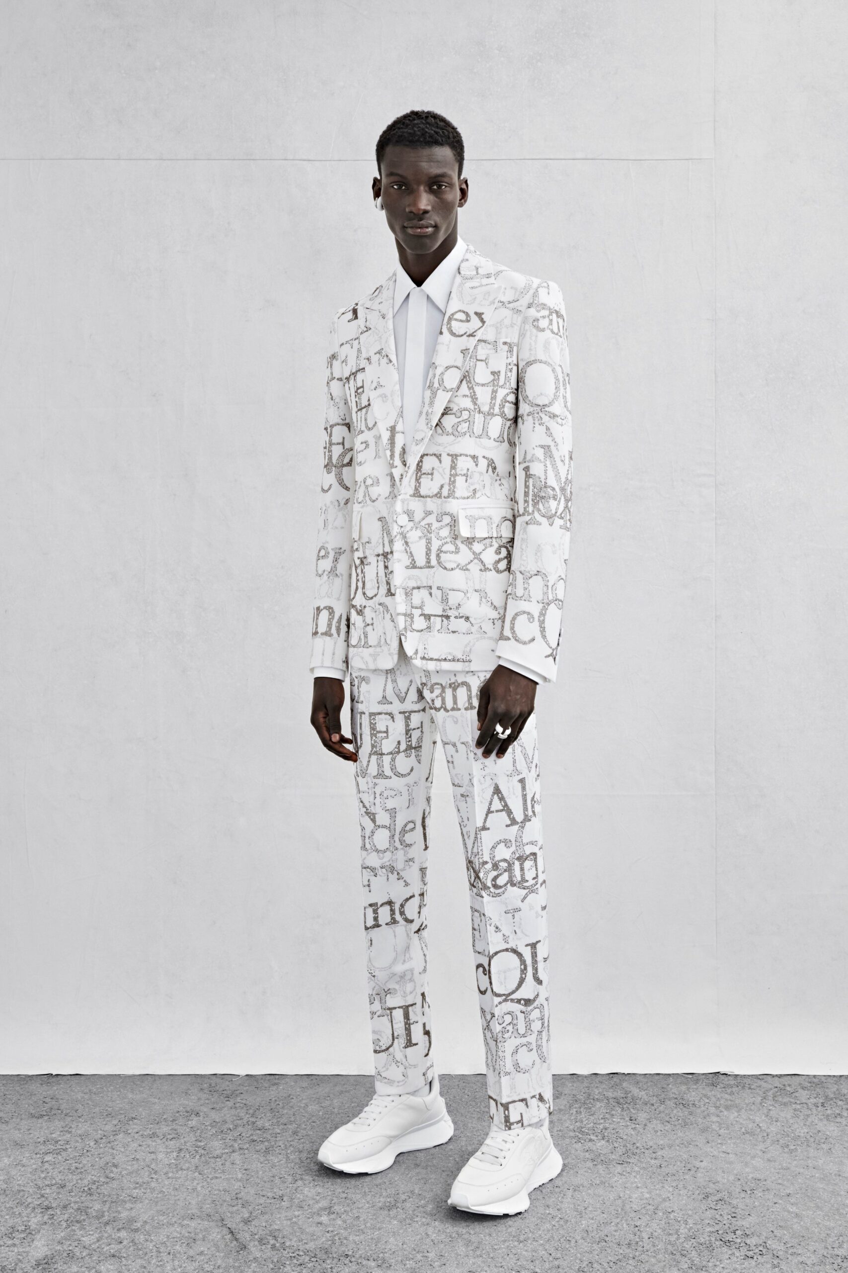 white tailored suit with printed design