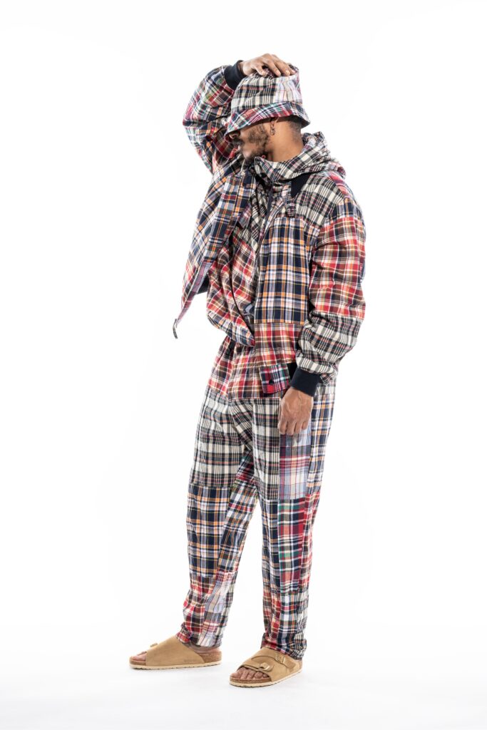 A relaxed fit checked jacket with long sleeves paired with matching checked pants.