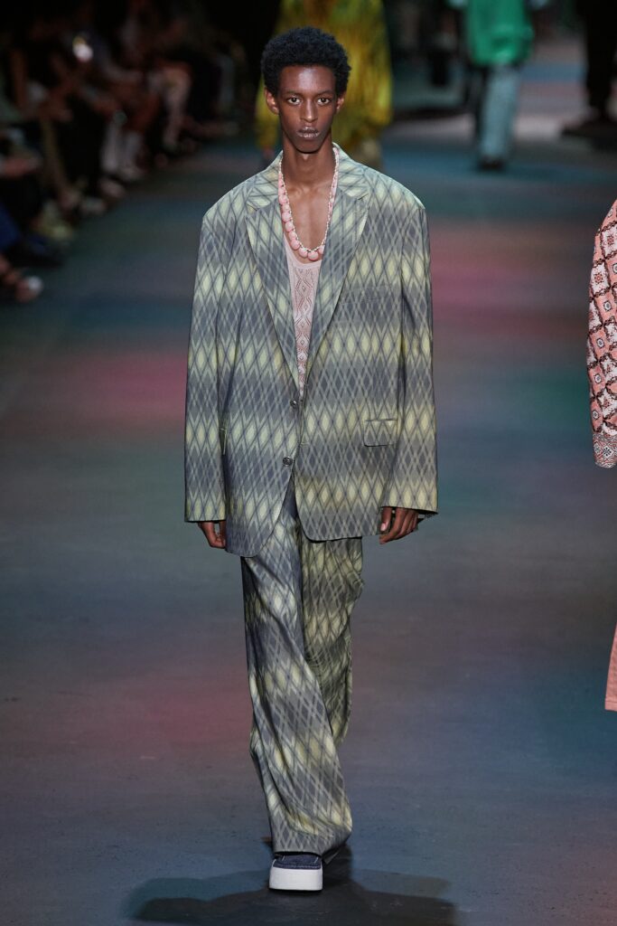 A relaxed green checked suit featuring a long-sleeve collared shirt.