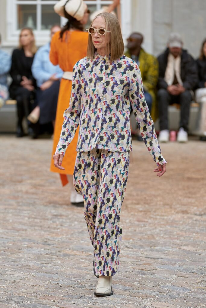 A relaxed multicolor shirt with long sleeves and matching pants featuring a printed design.