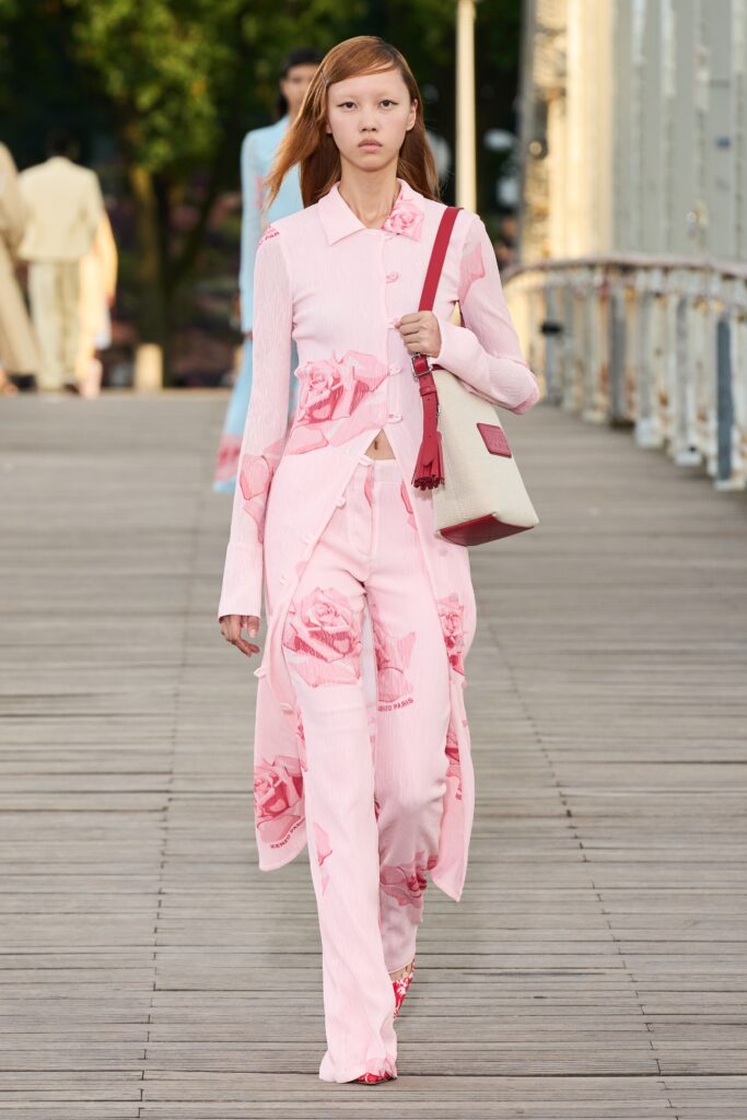 A relaxed pink floral long-sleeve shirt paired with matching pants for a stylish look.