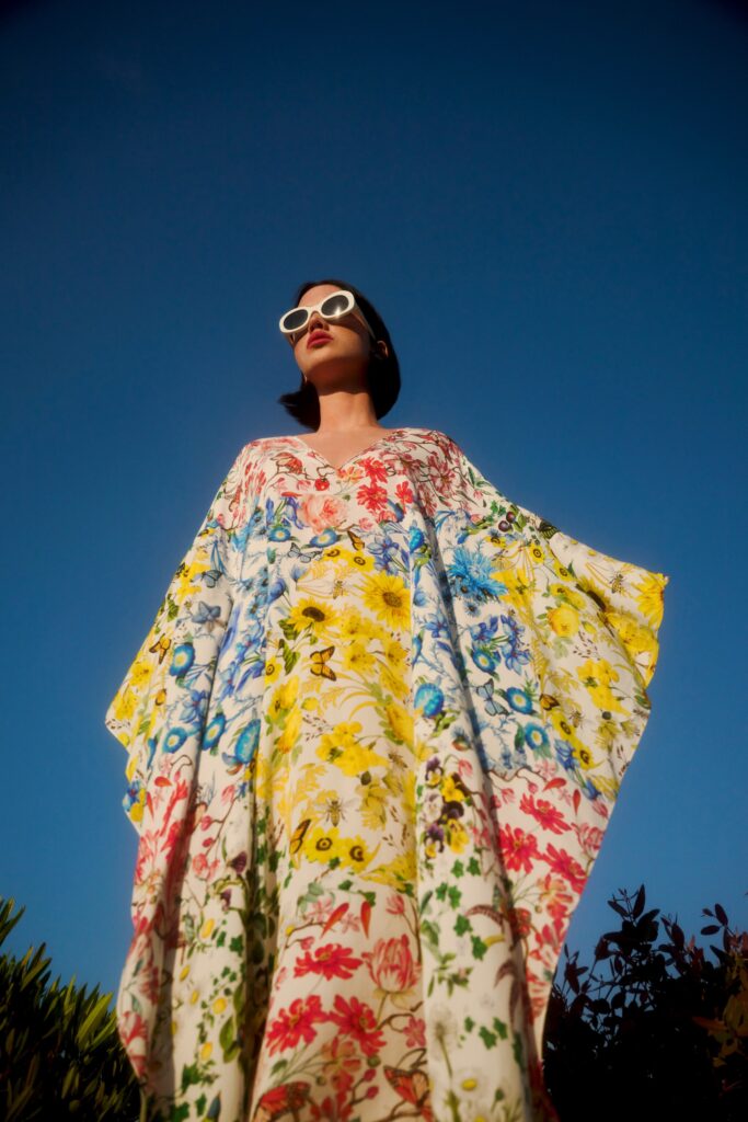 A relaxed multicolor dress with a V-neckline and flared silhouette, perfect for warm weather.
