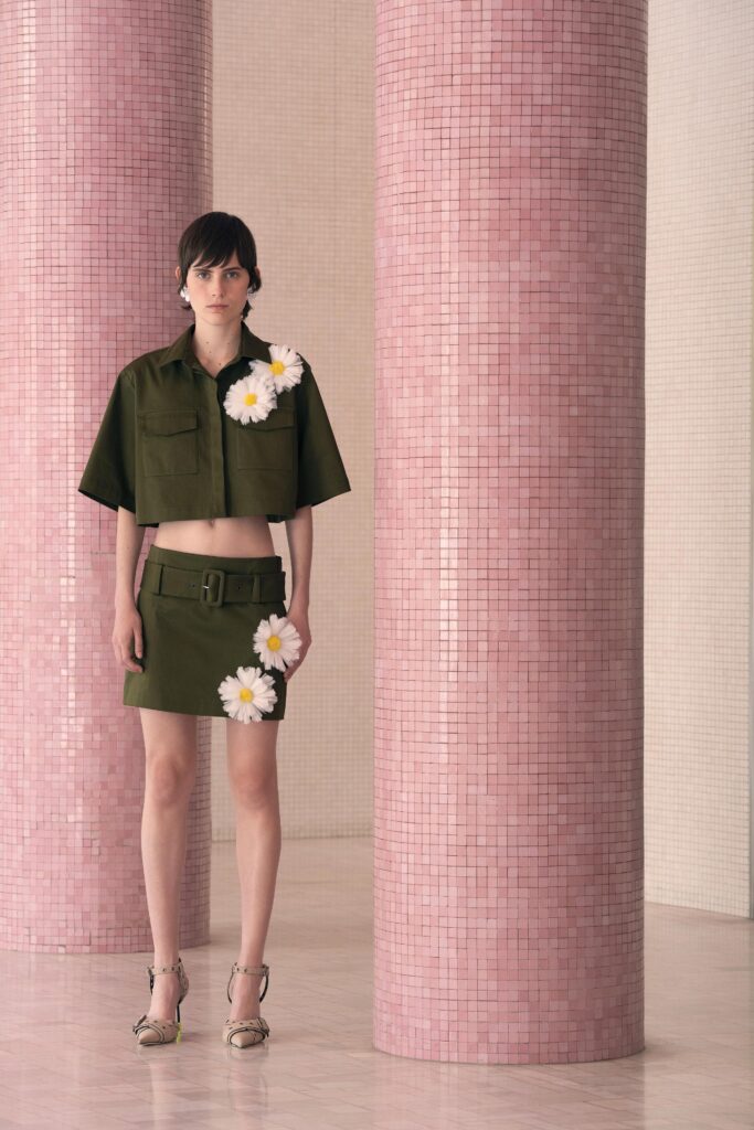 green fitted top and mini skirt