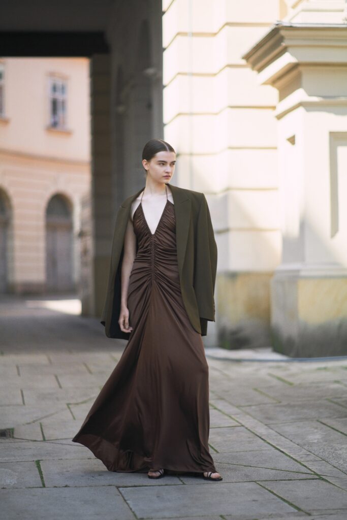 brown silk fitted gown with green coat