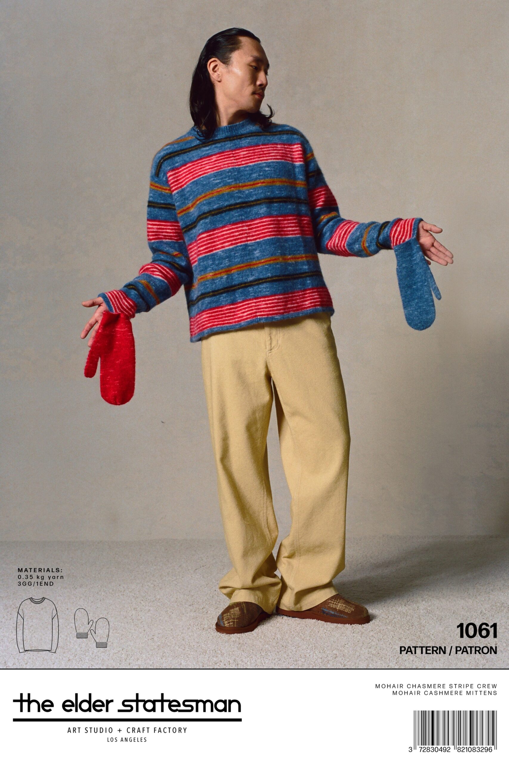 A relaxed striped sweater with long sleeves paired with cream pants for a casual look.