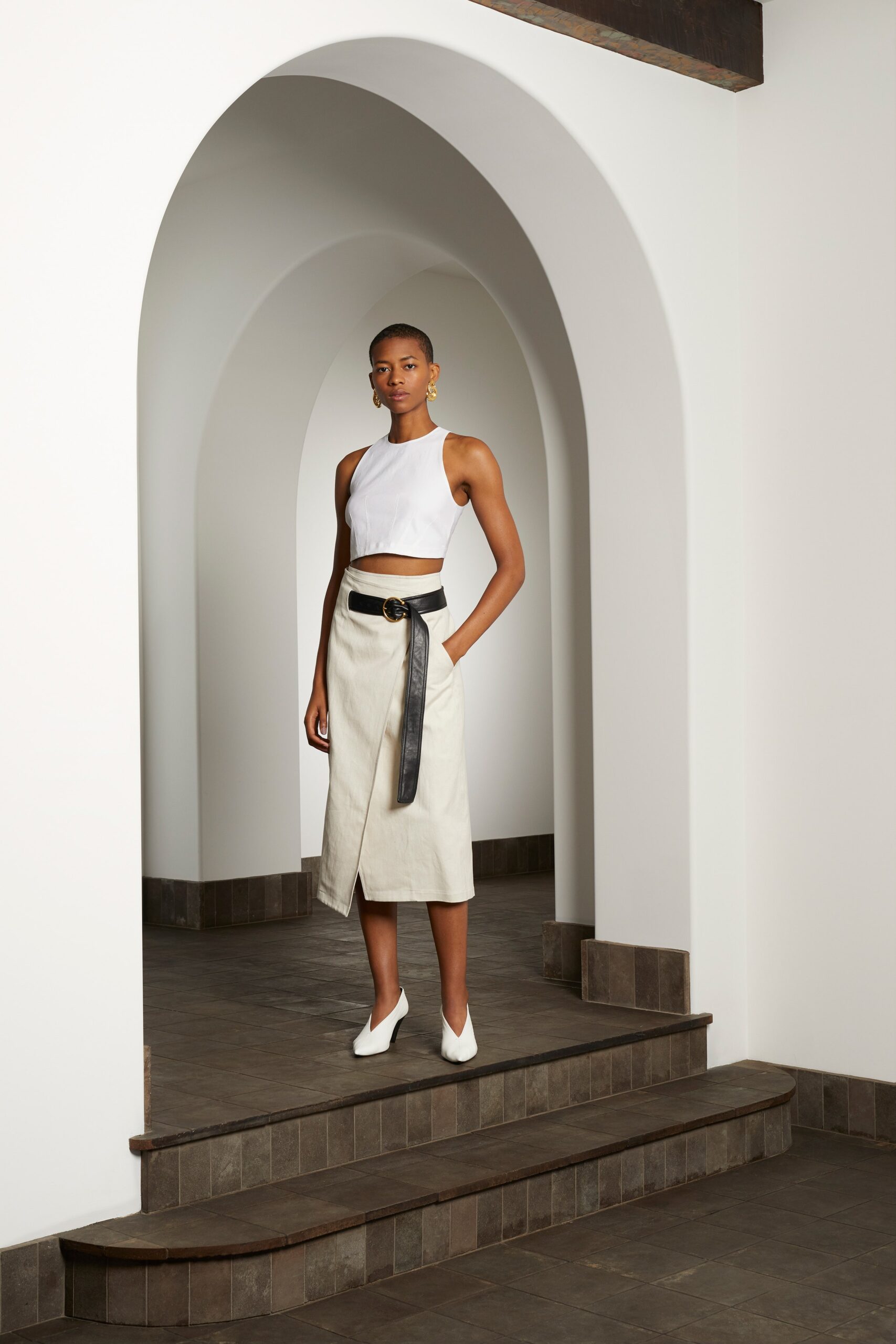 white fitted top beige skirt