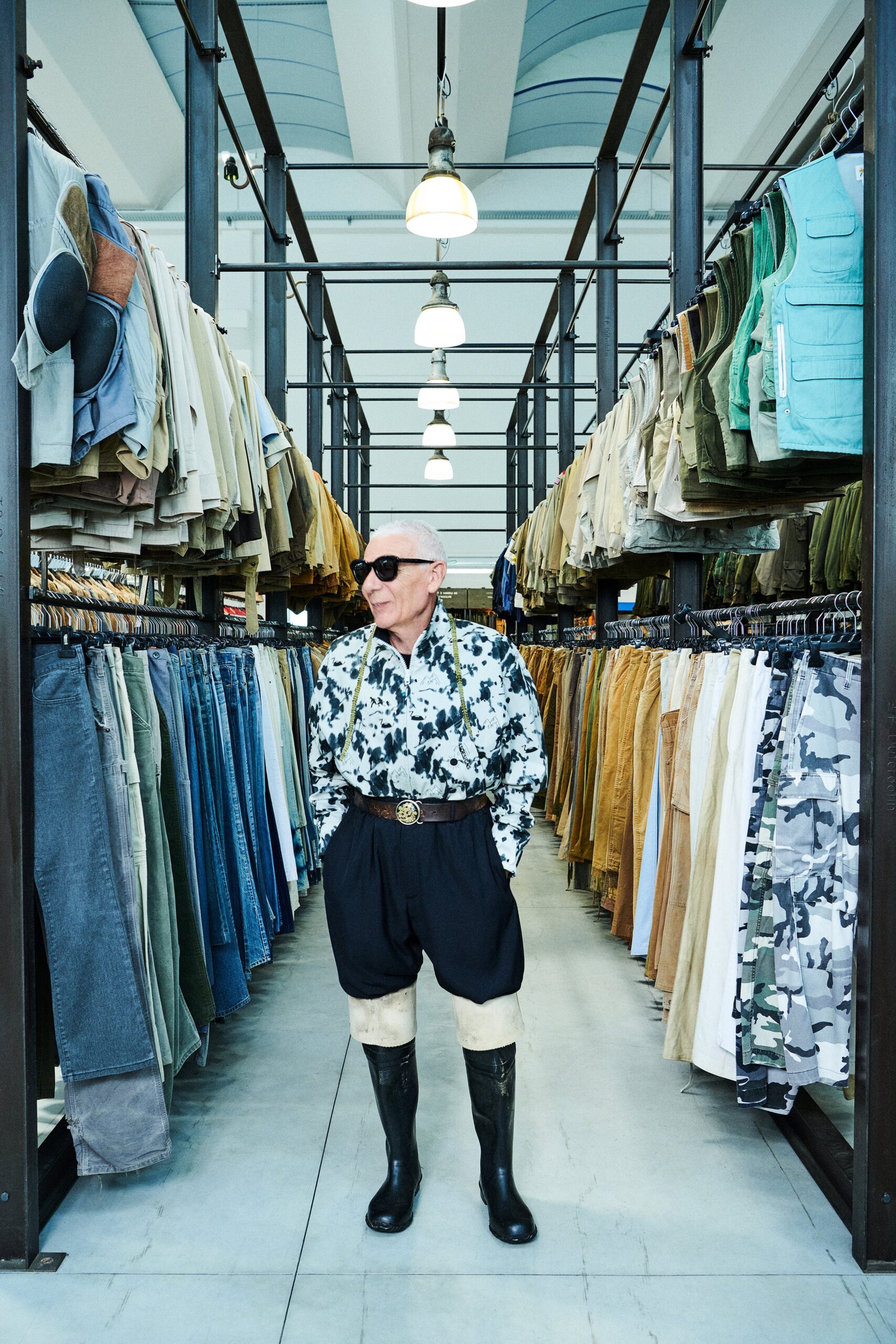 A relaxed black and white printed shirt with short sleeves and collared design.