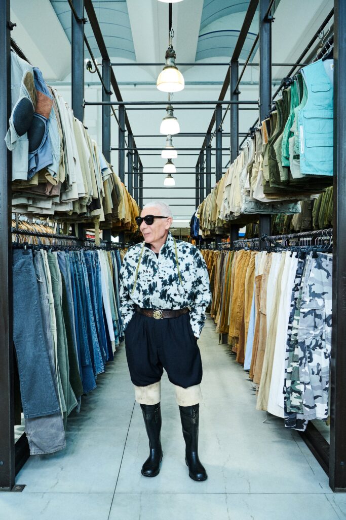 A relaxed black and white printed shirt with short sleeves and wide-leg pants.