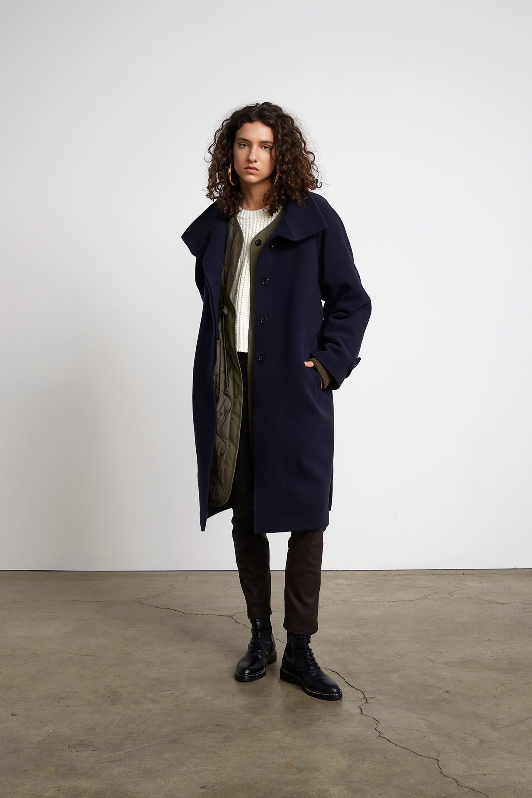 navy wool coat with white sweater