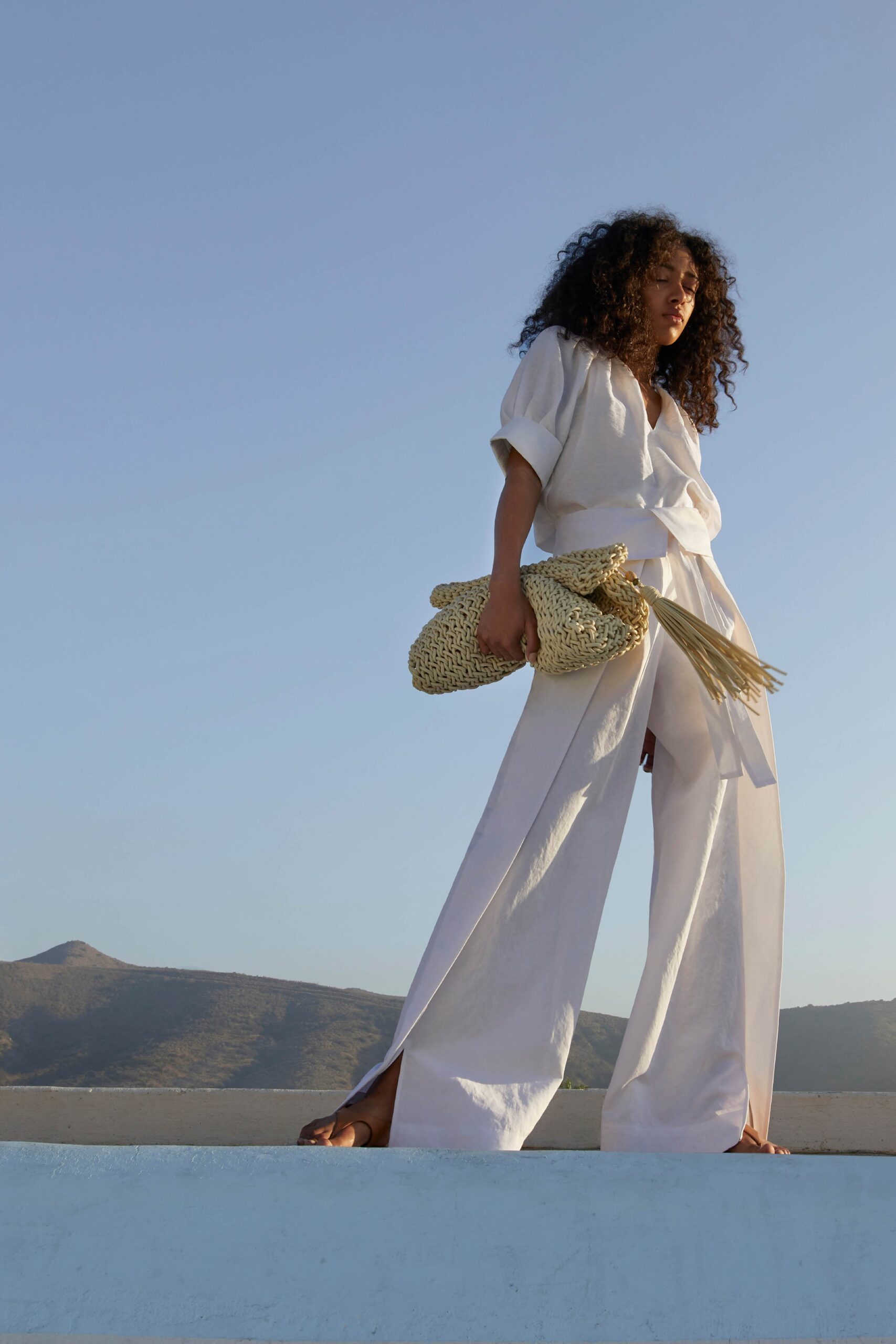 white relaxed top and fitted pants
