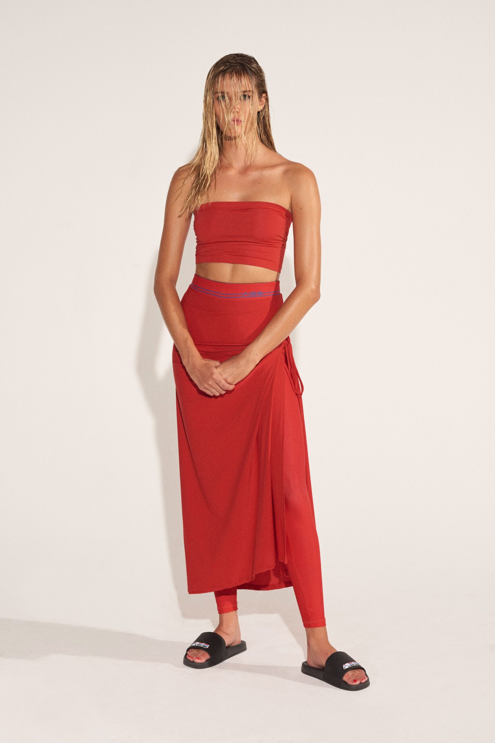 red crop-top and midi skirt