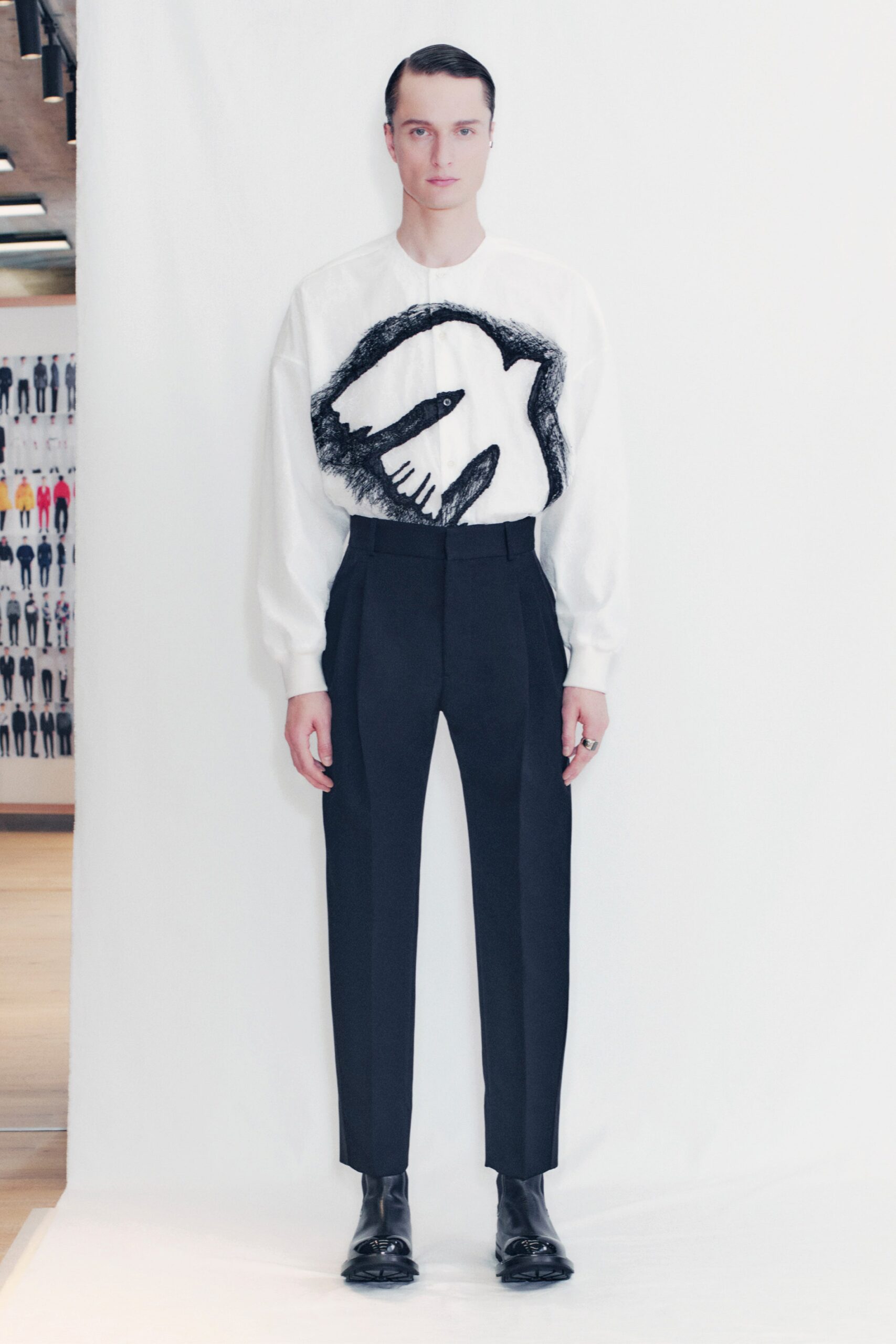 white collared shirt with black pants