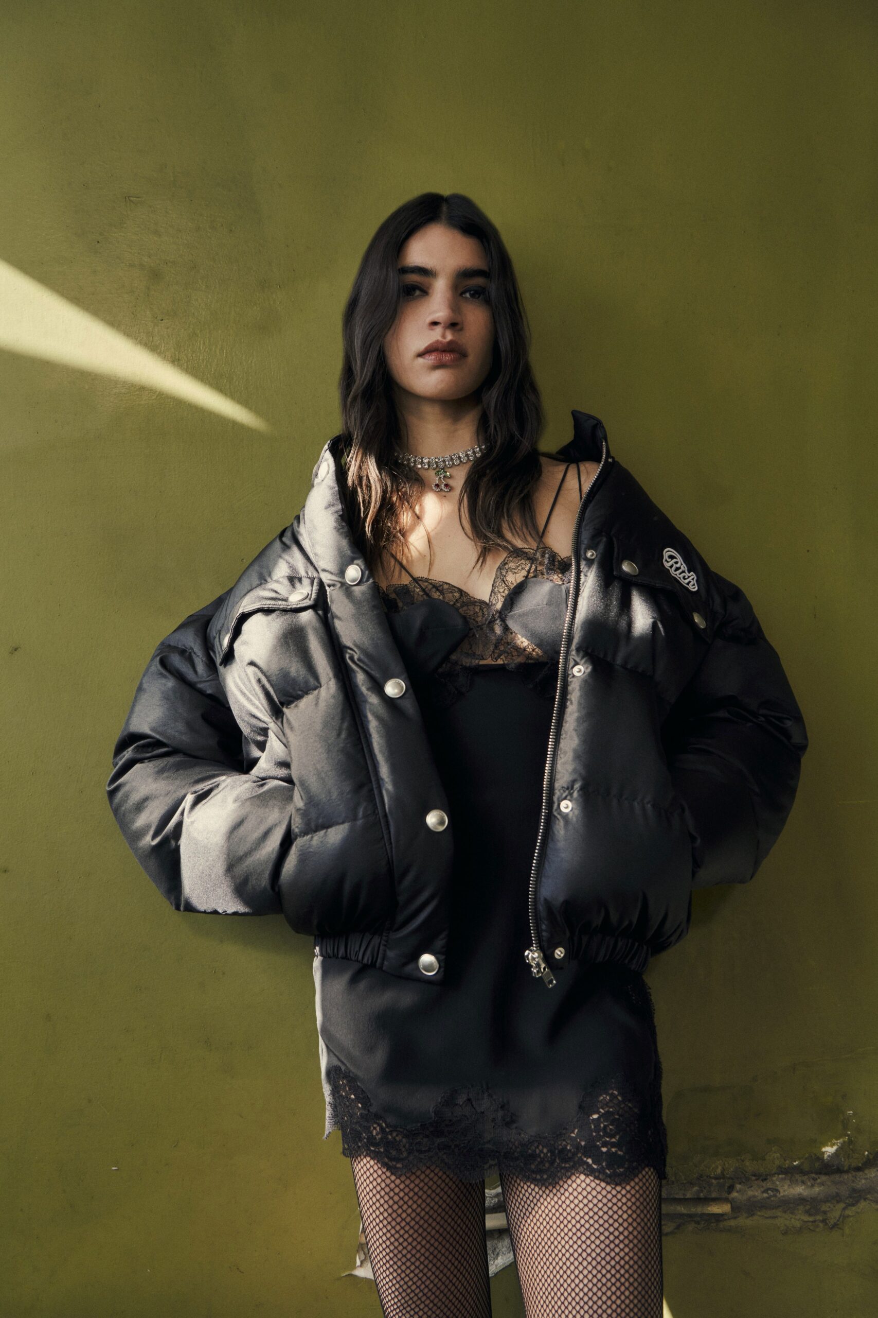 black vinyl long-sleeve collared oversized buttoned jacket