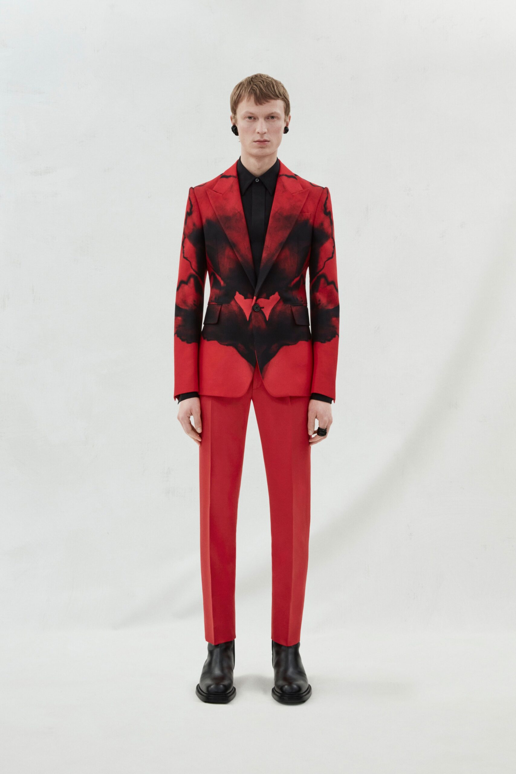 red and black printed suit