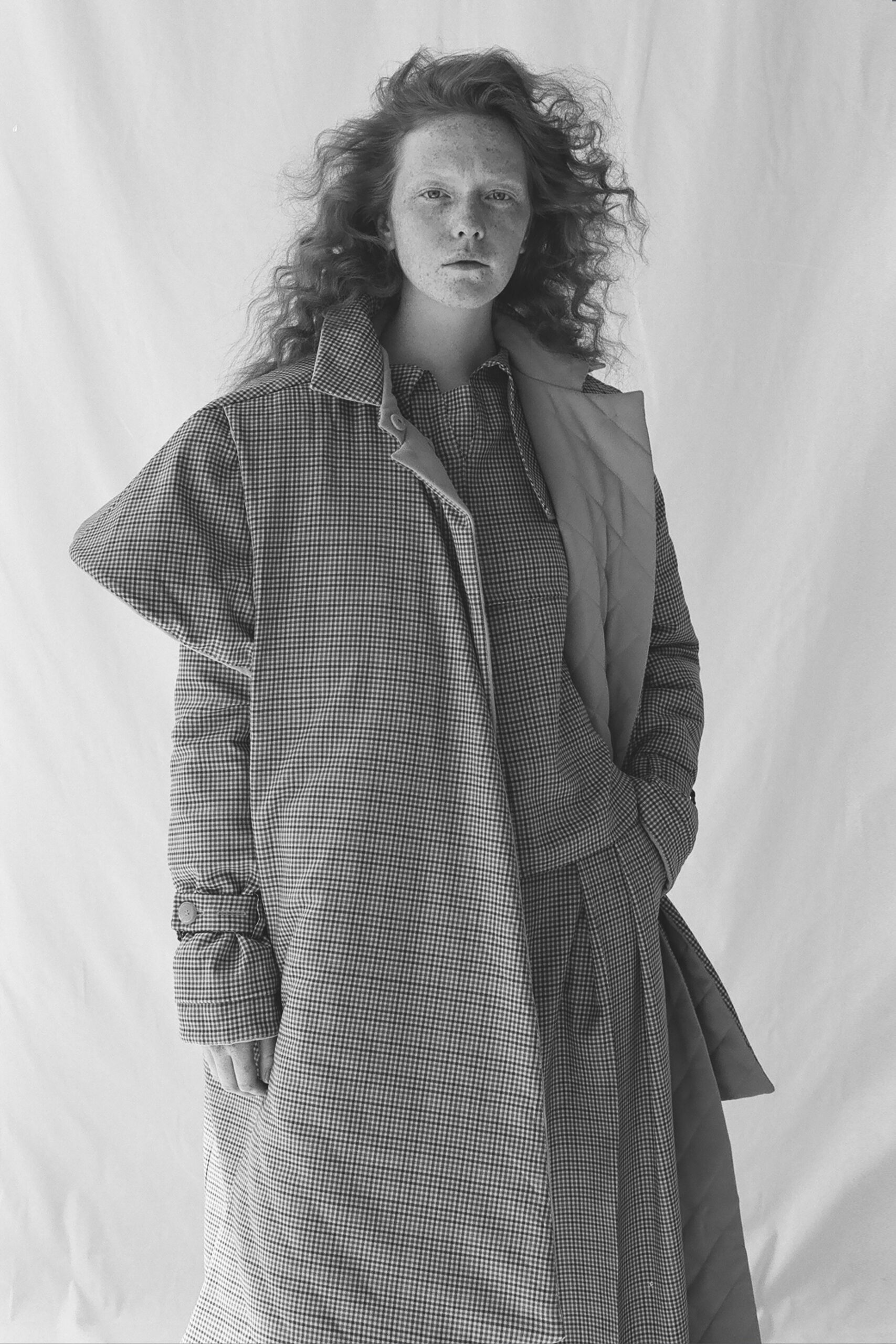 black cotton long-sleeve collared relaxed checked coat