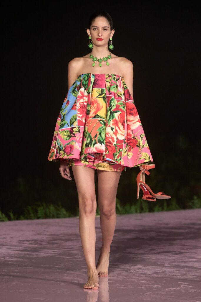 A relaxed multicolor floral strapless dress with a flared silhouette.