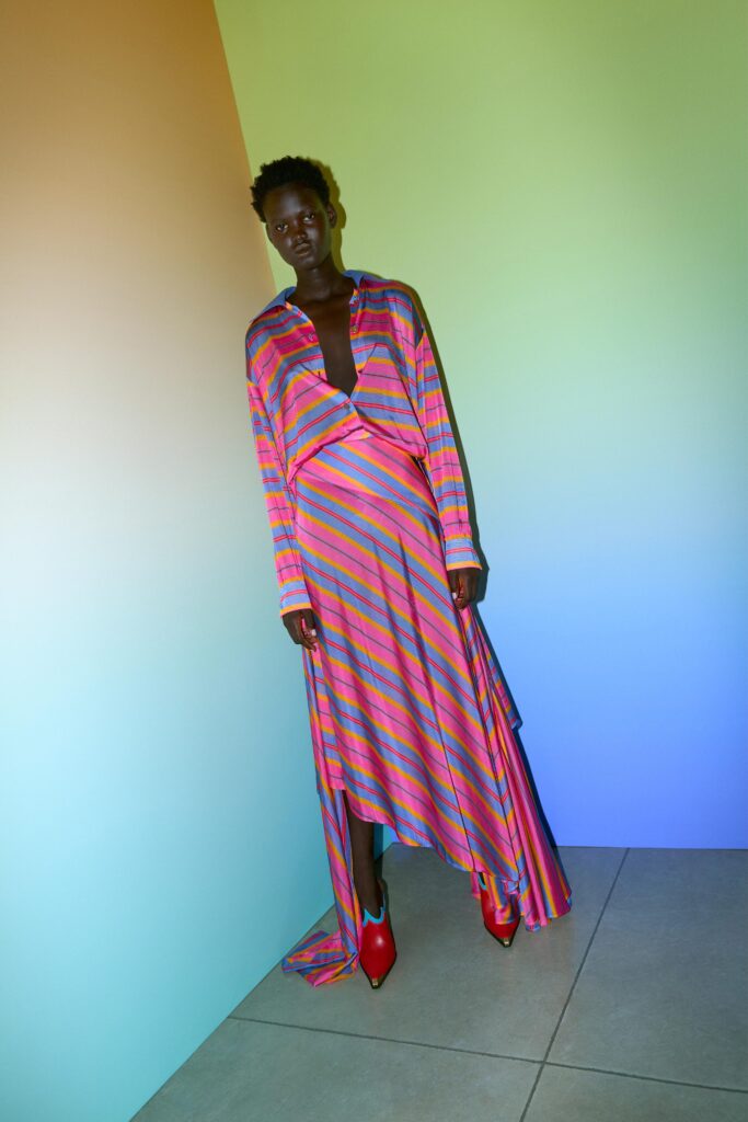 A relaxed multicolor silk dress with a long sleeve and asymmetric design.