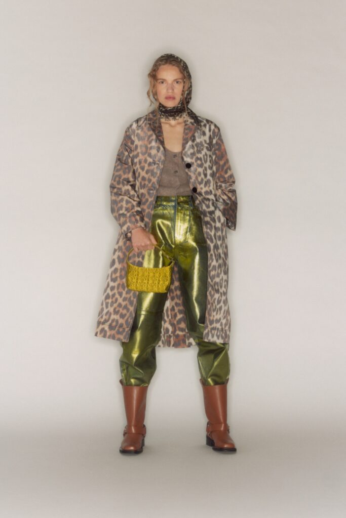 A relaxed brown animal-print coat paired with wide-leg green pants for a bold fashion statement.