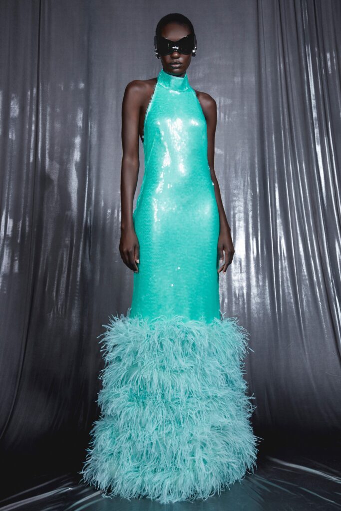 aqua sequin gown with feathers