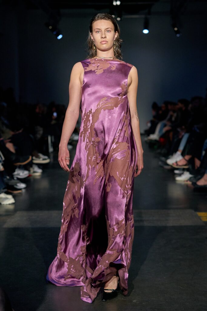 purple silk draped gown