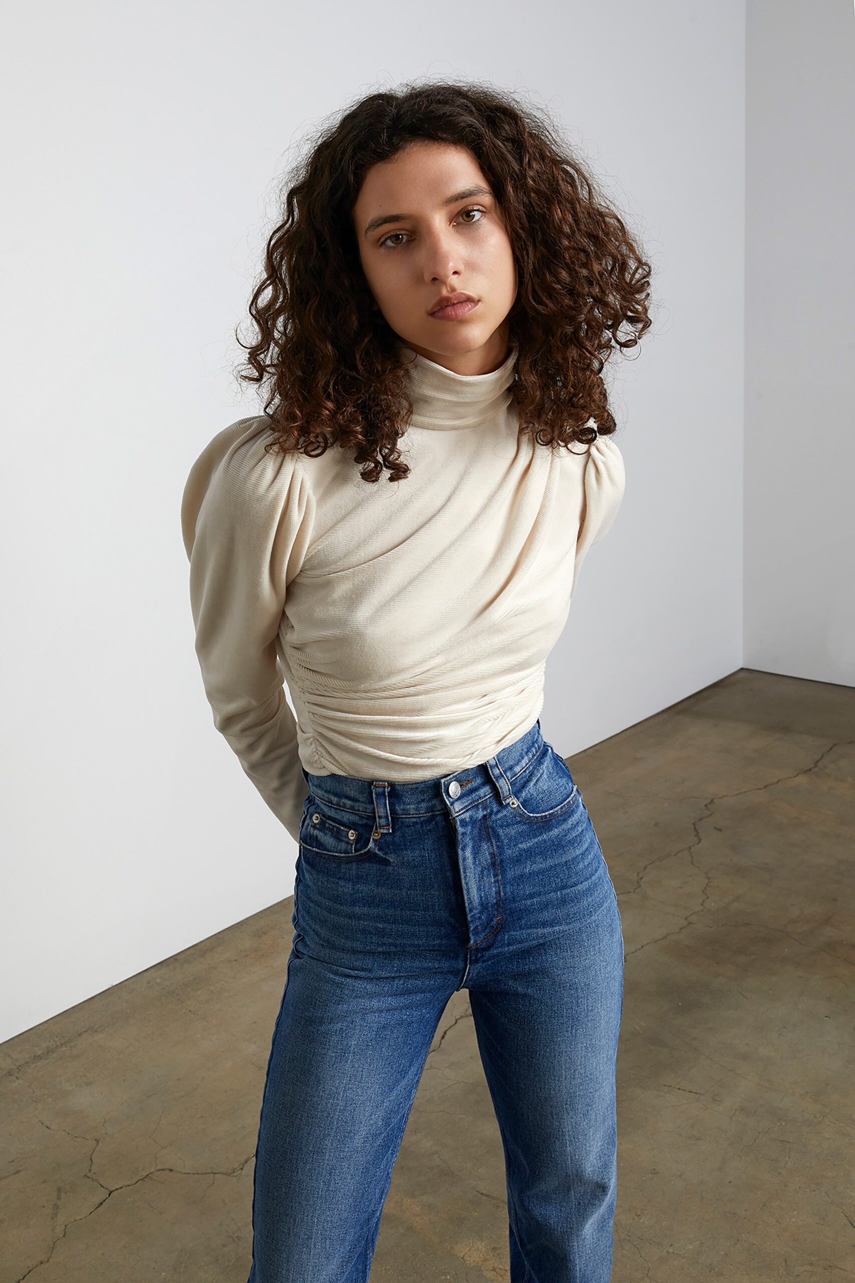 fitted white top with blue jeans