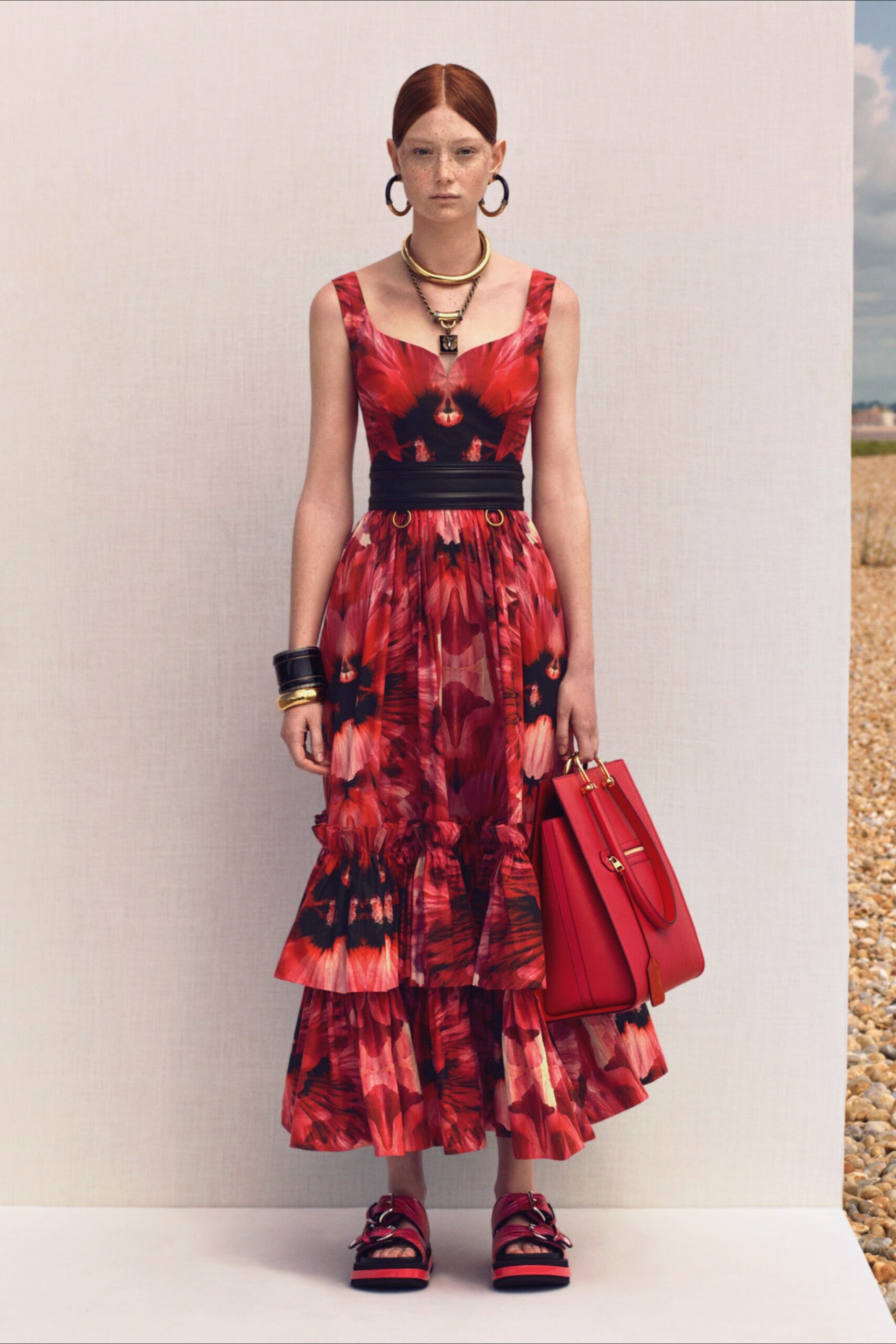red cotton sleeveless v-neck fitted flared tiered dress