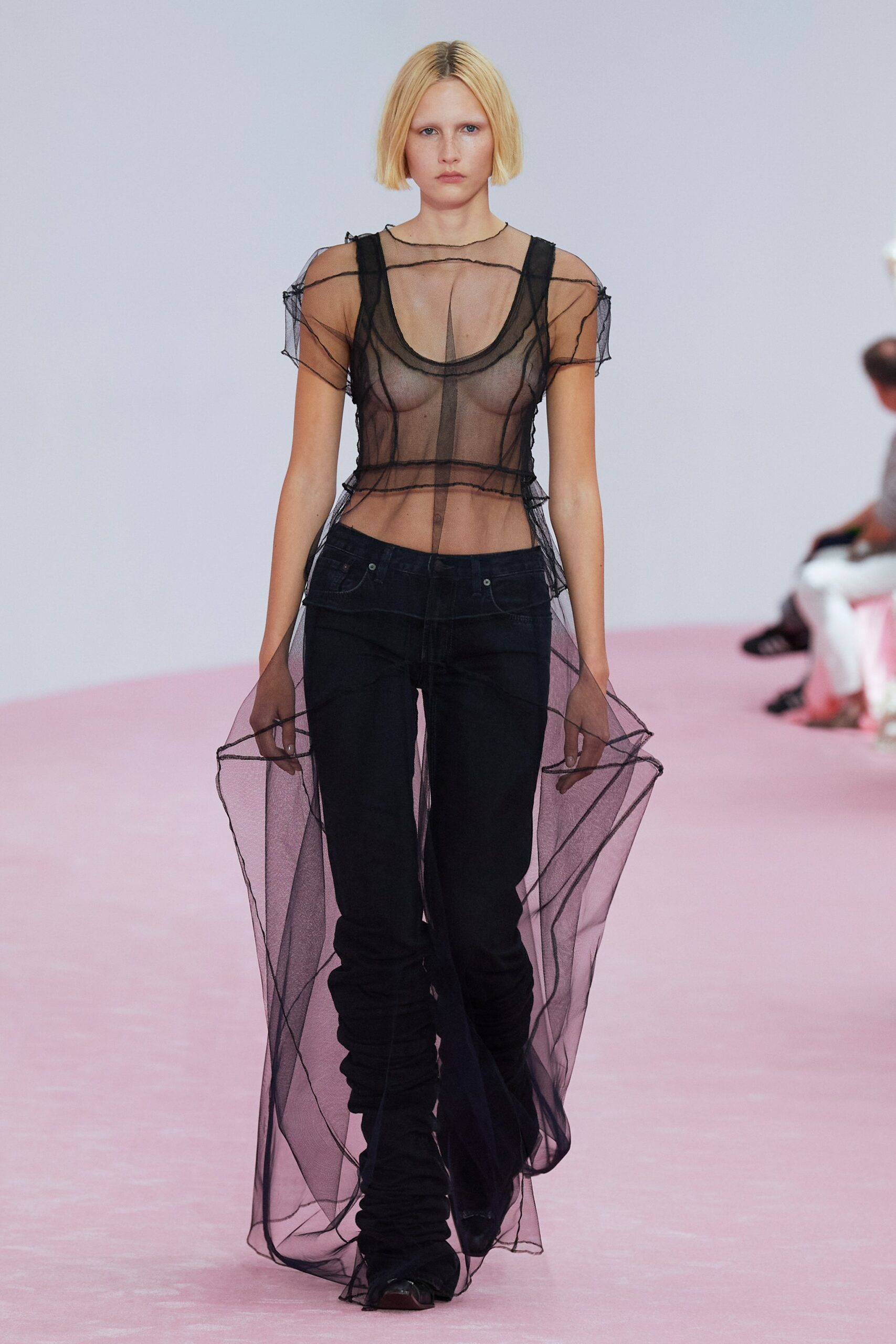sheer black top with slim jeans