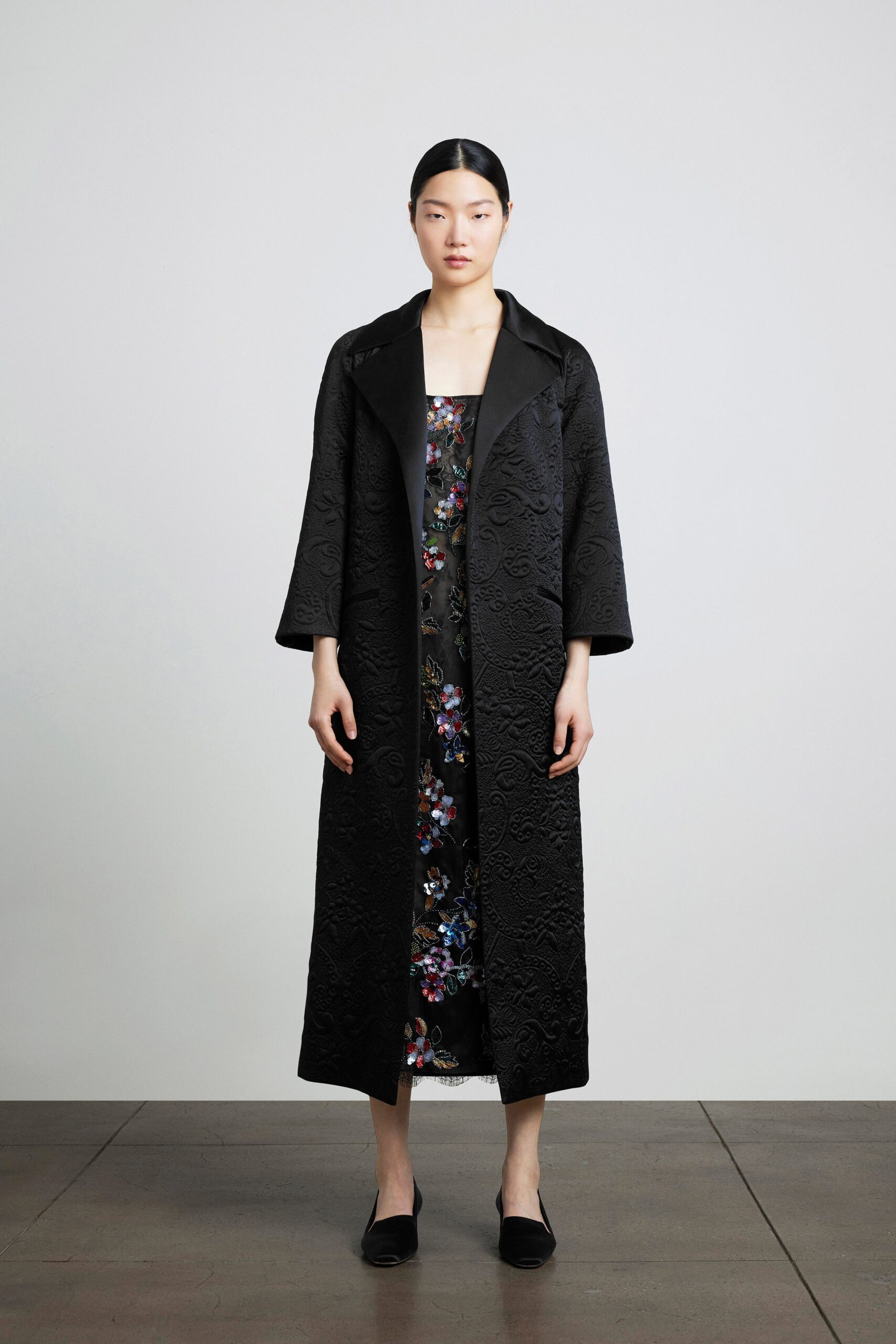 black embroidered coat and floral dress