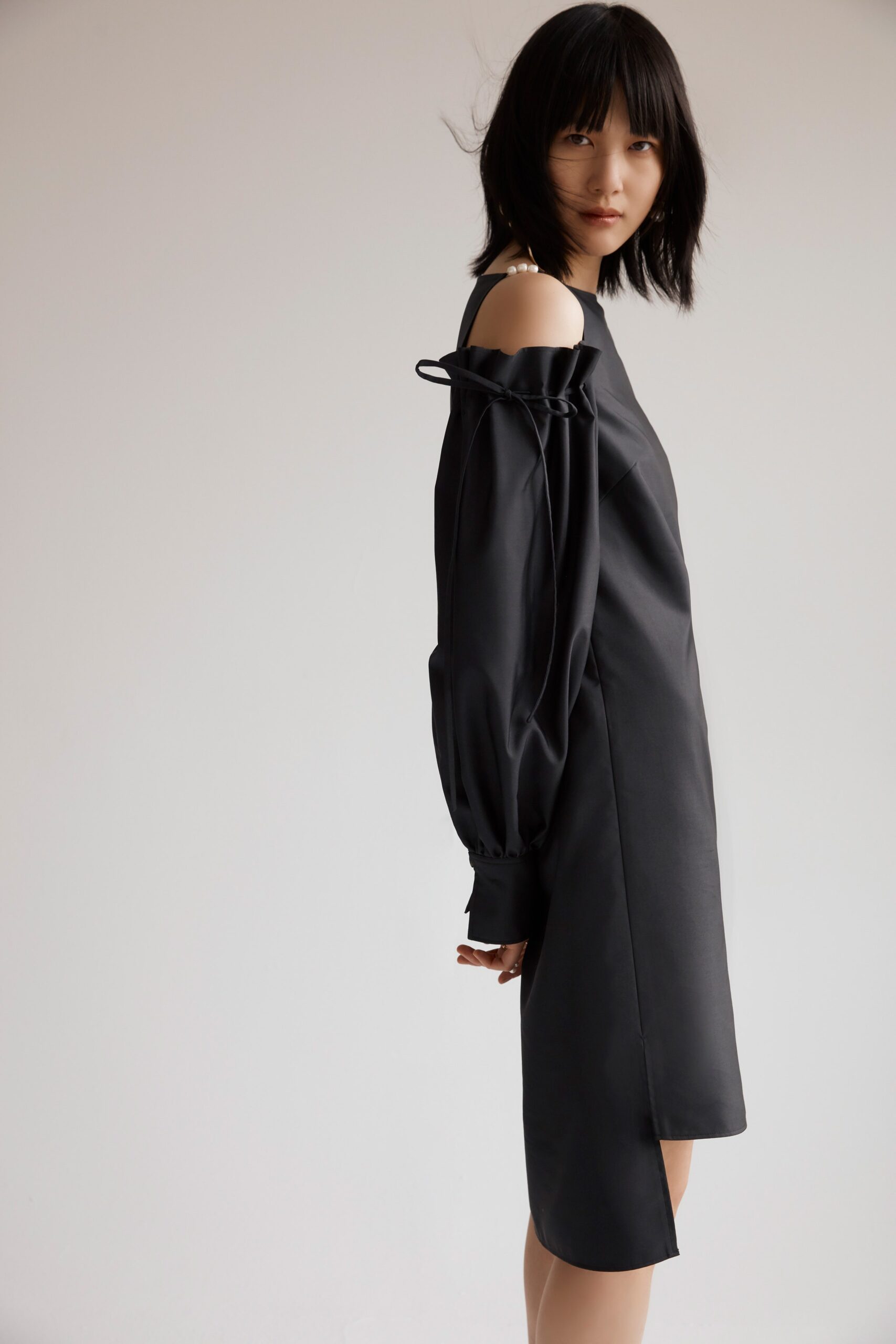 black silk off-shoulder dress