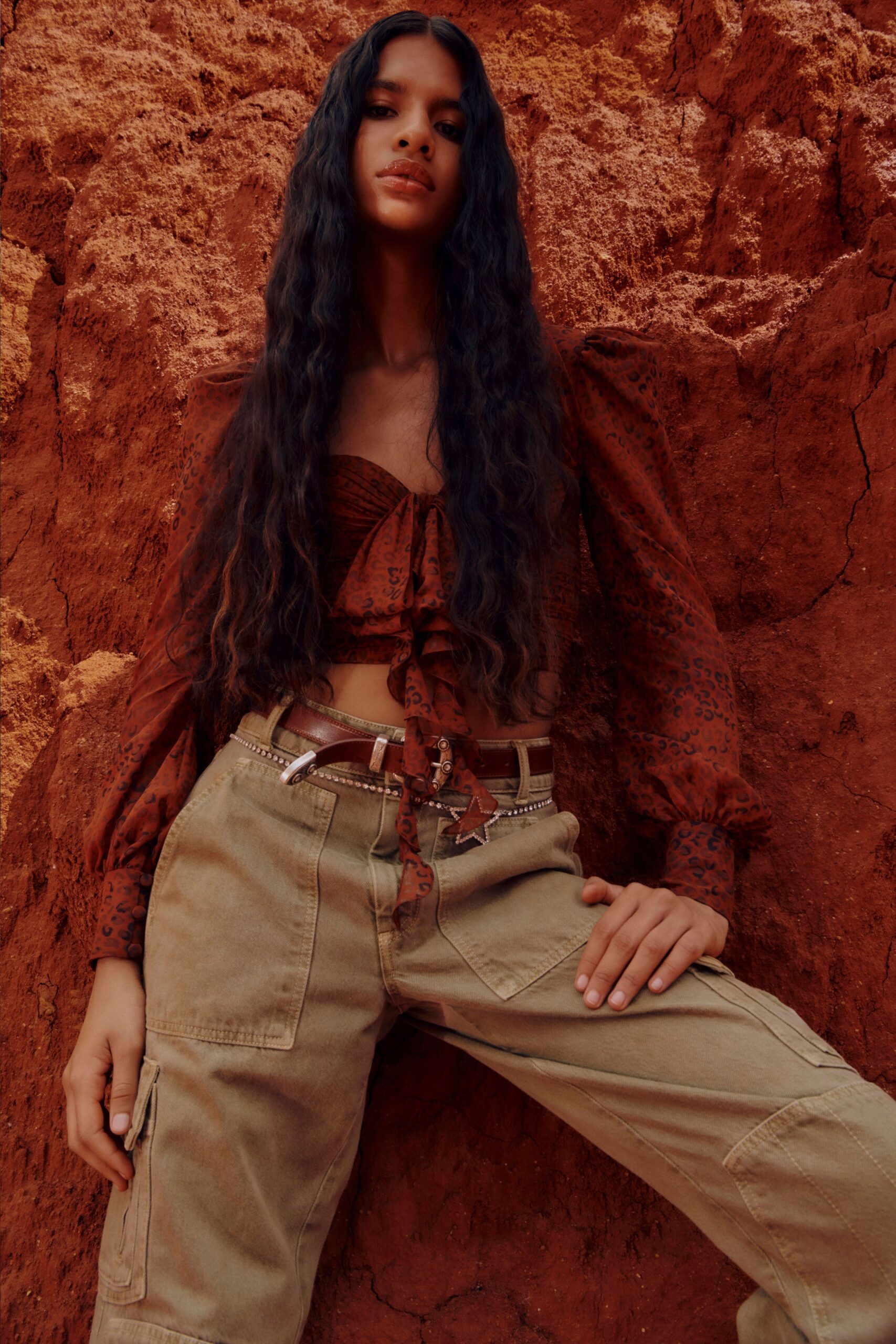 brown fitted top with beige cargo pants