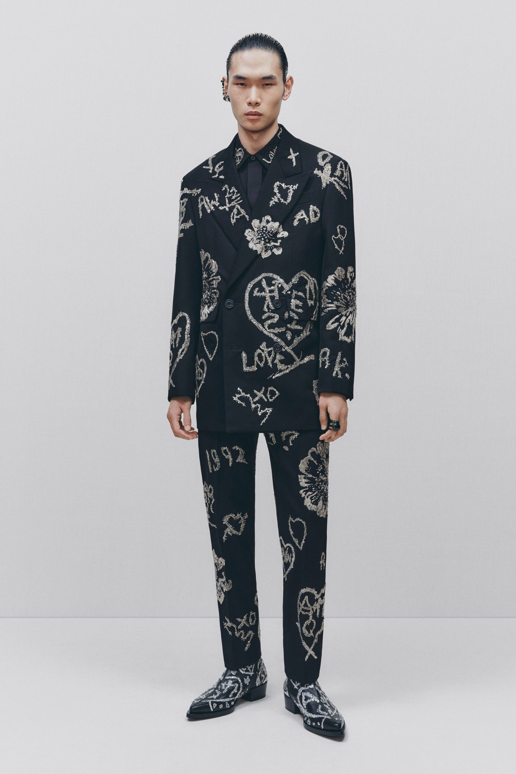 black embroidered tailored suit