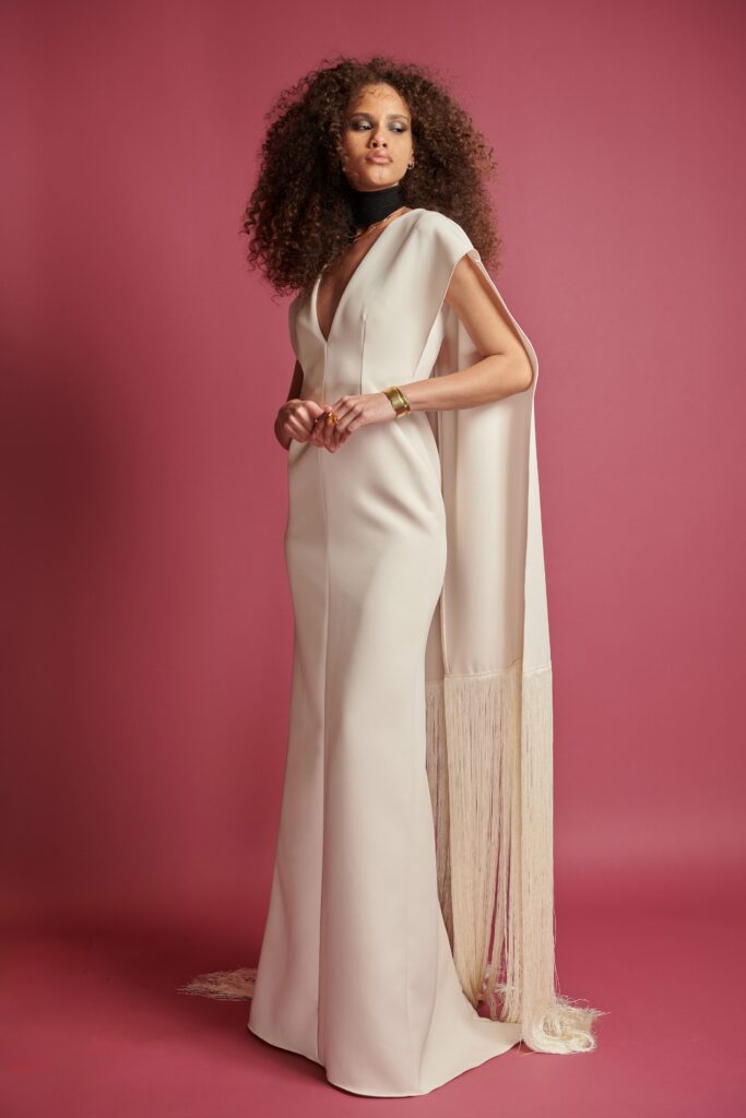 beige silk fitted gown with cape