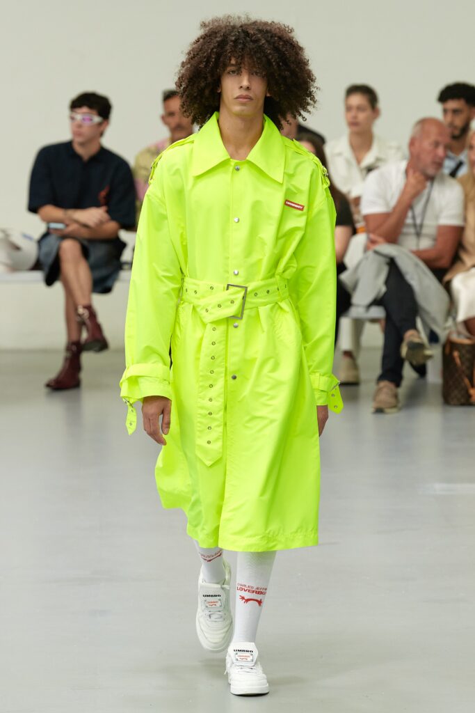 A relaxed neon cotton coat with long sleeves and a belted design.
