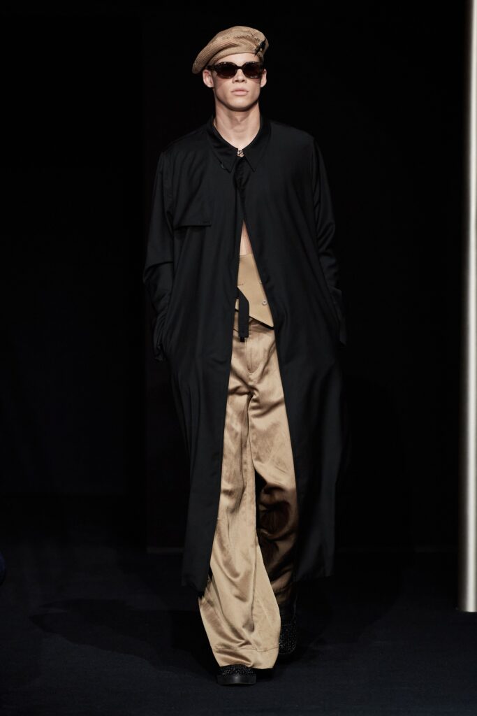 black silk coat with beige pants