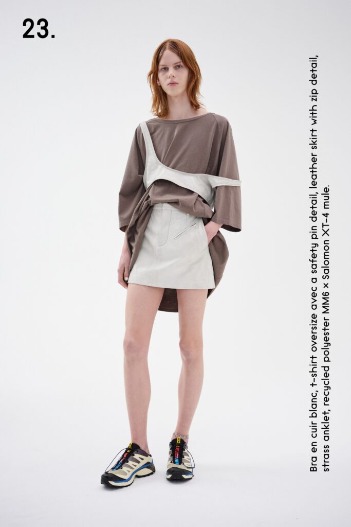 A relaxed brown and white dress top with short sleeves and an asymmetric design.