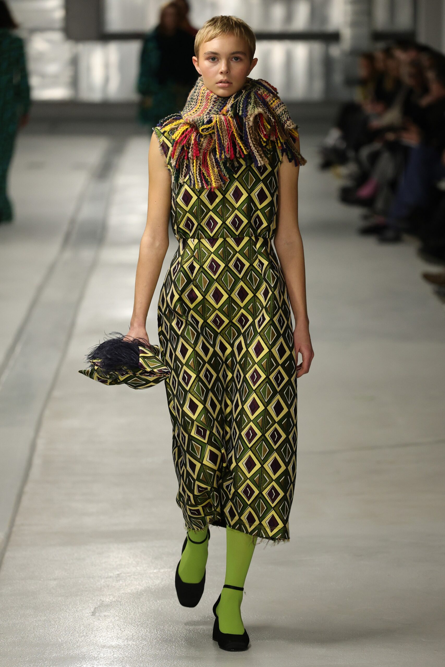printed green jumpsuit with scarf