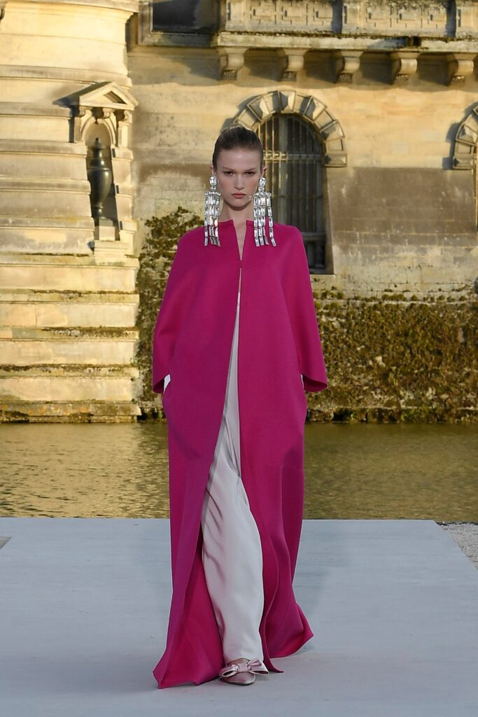 pink cape and white dress
