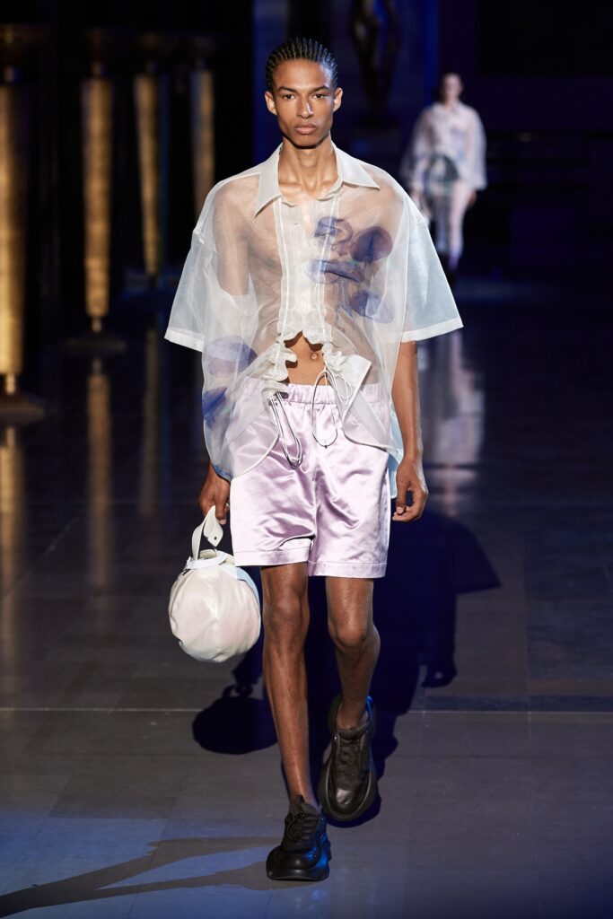 white sheer shirt pink shorts