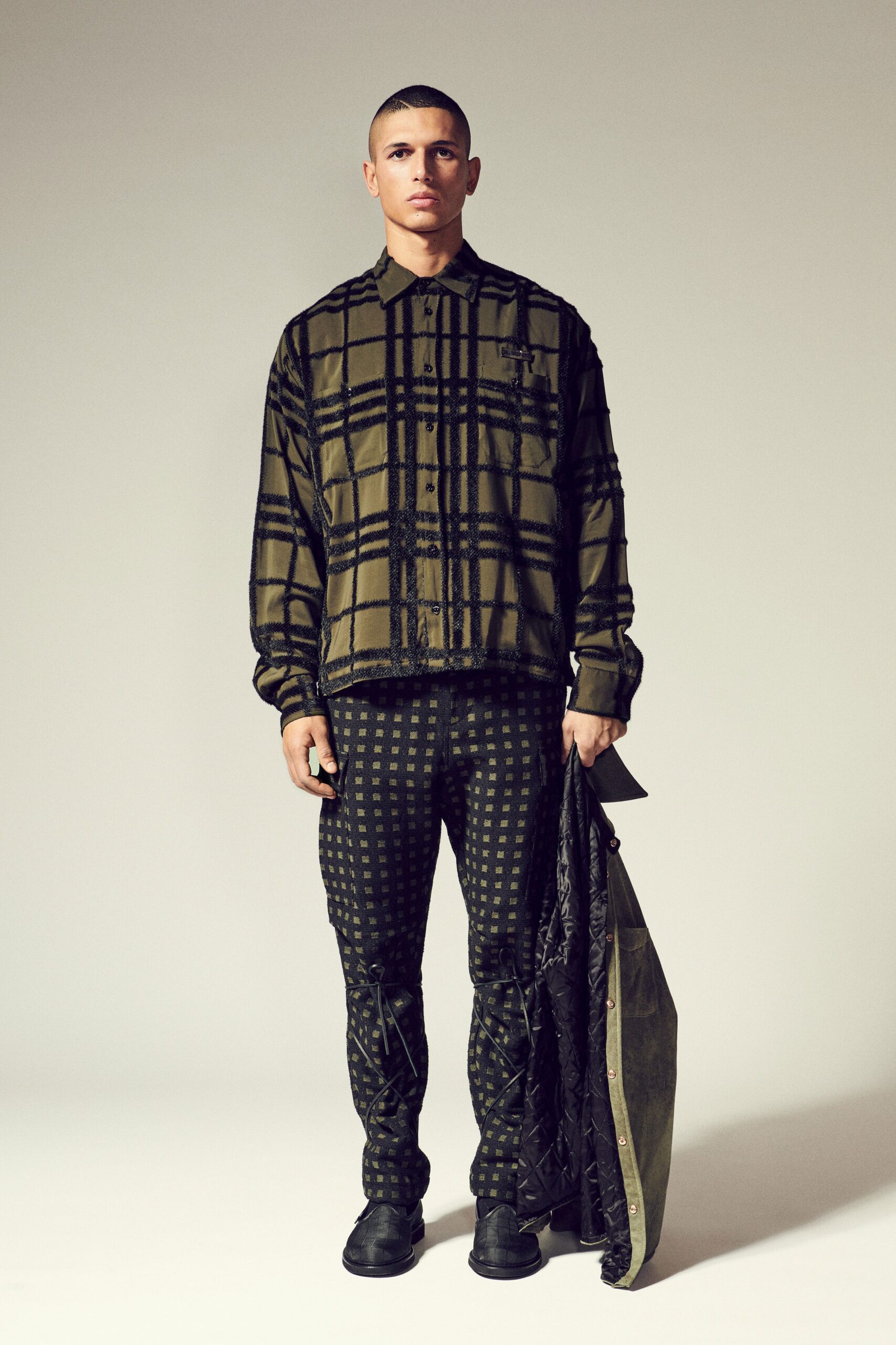 green black checked shirt with printed pants