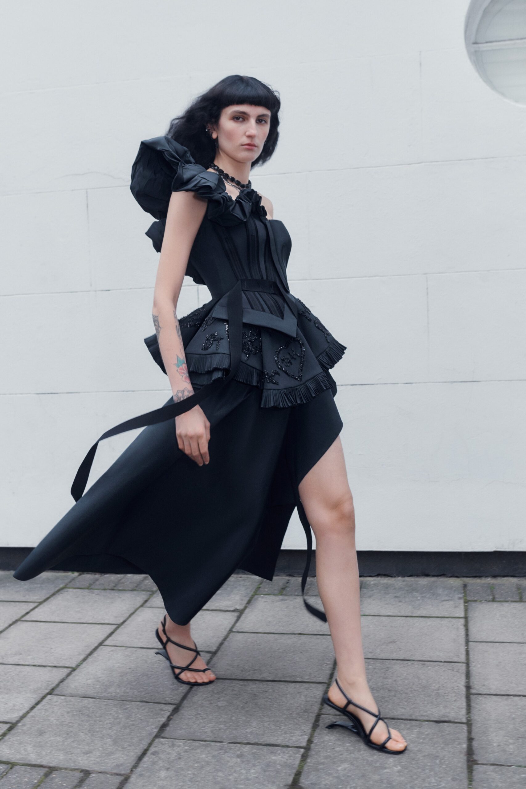 black fitted sleeveless dress