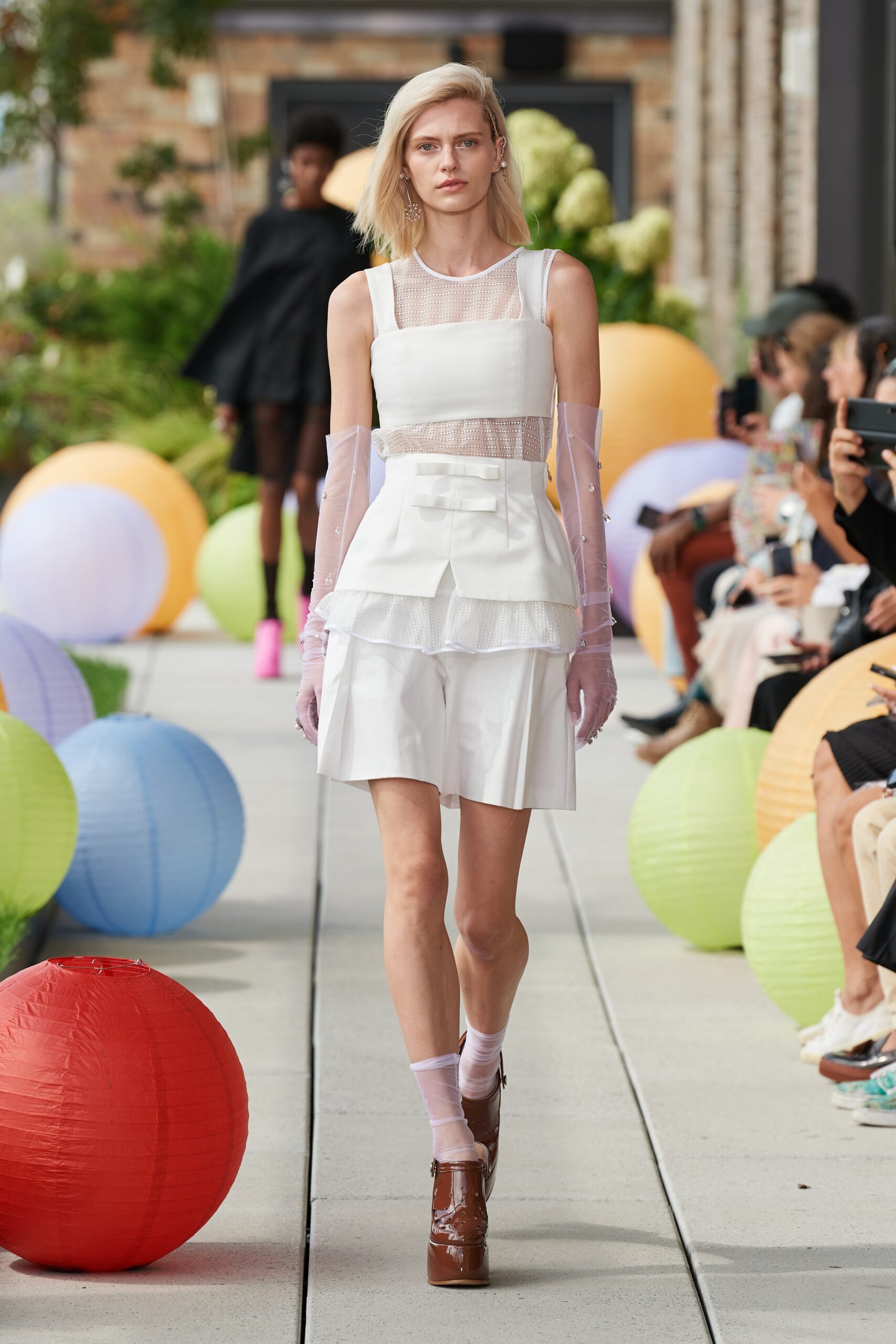 white fitted top and skirt